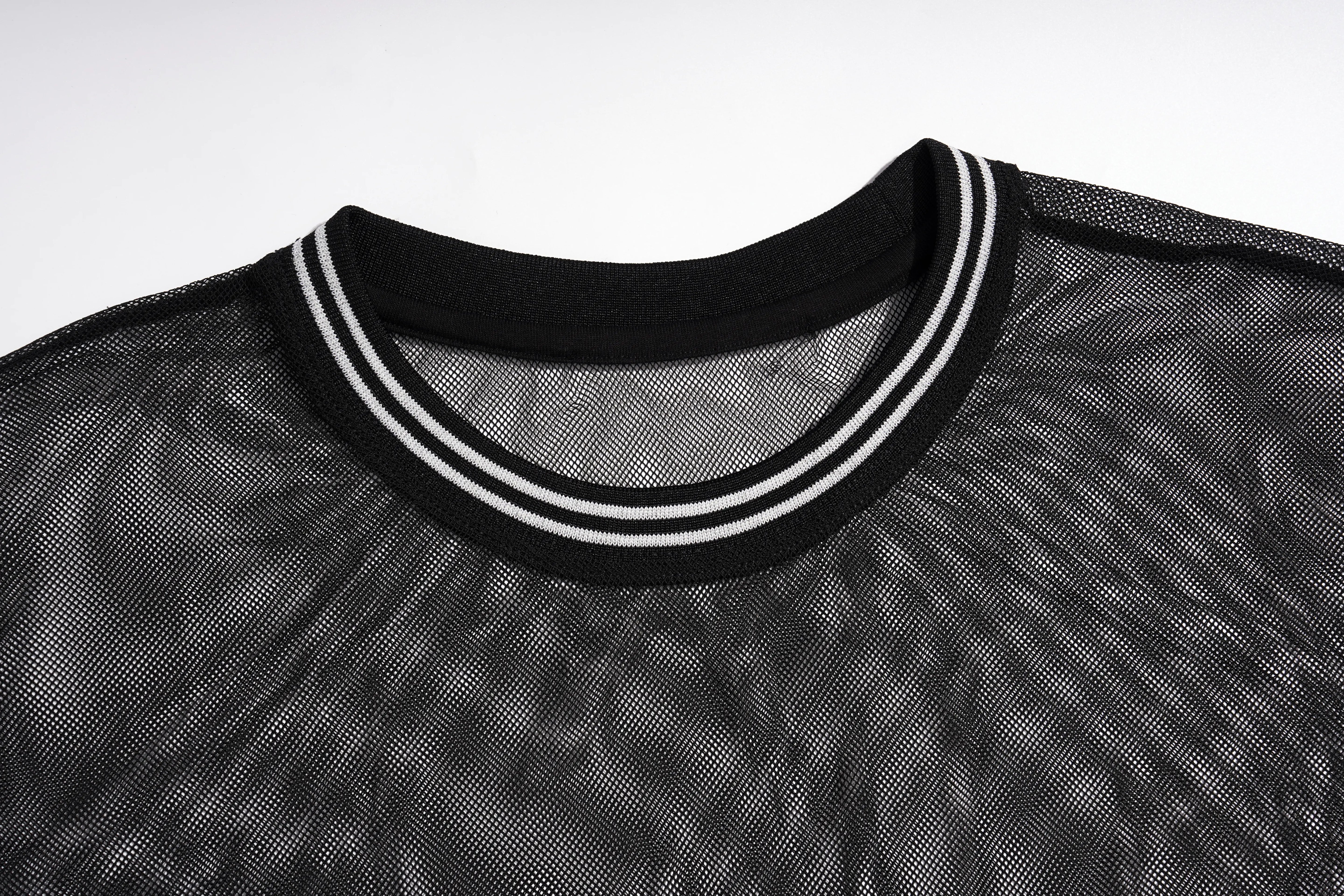 Close-up of a black mesh crewneck shirt with a black ribbed collar trimmed in white double stripes, shown against a light gray background. TCH Rhinestone Deer Graphic Mesh Sleeve Black Streetwear T-Shirt