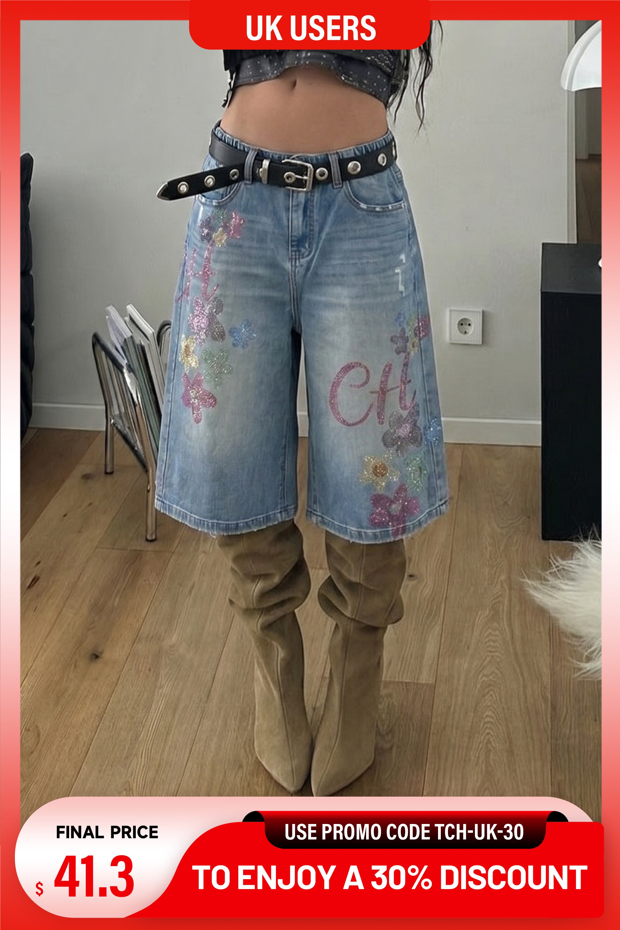 Person wearing floral denim shorts with a discount banner at the bottom. TCH Rhinestone Floral Logo Wide-Leg Denim Shorts