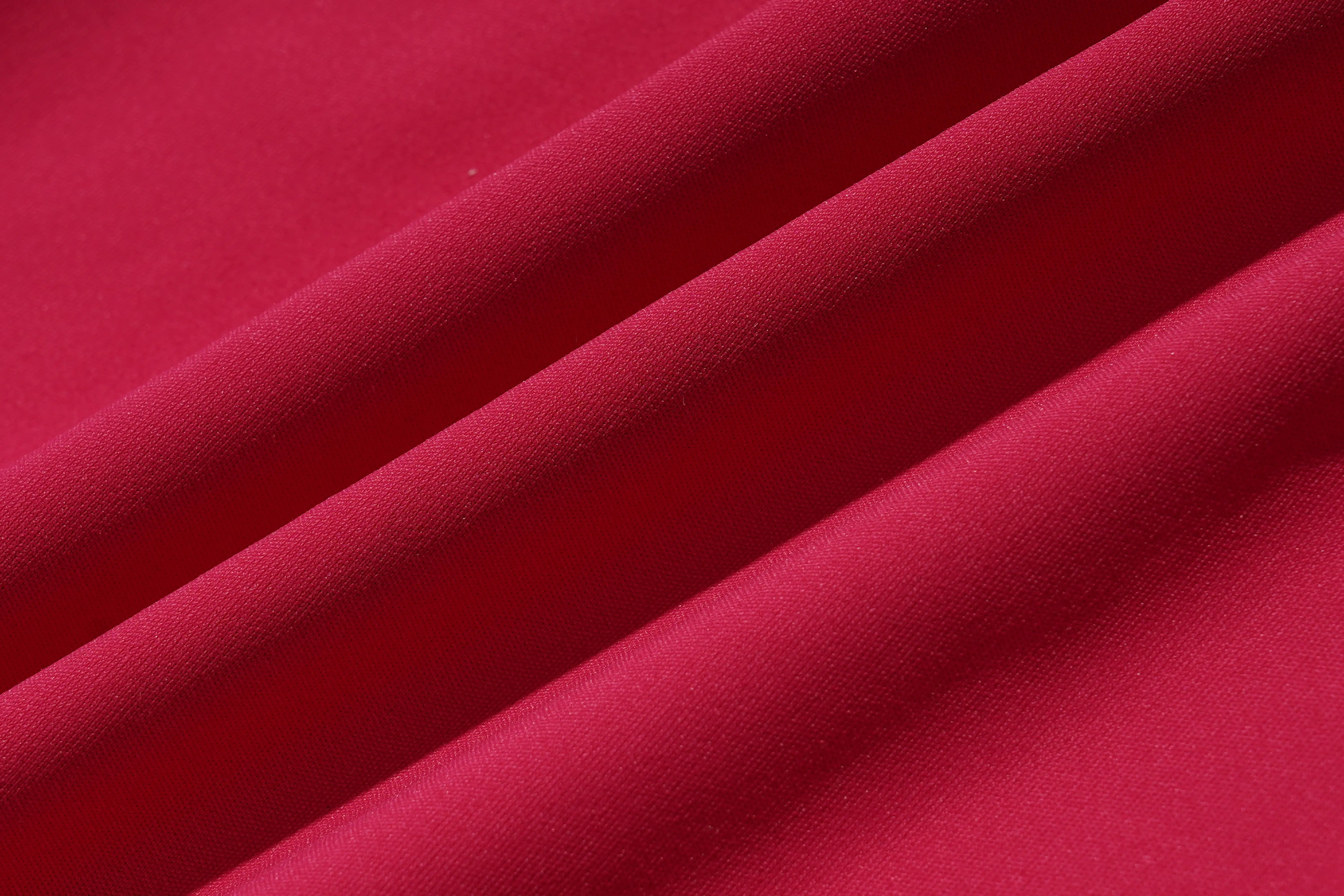 Close-up of red fabric with visible texture