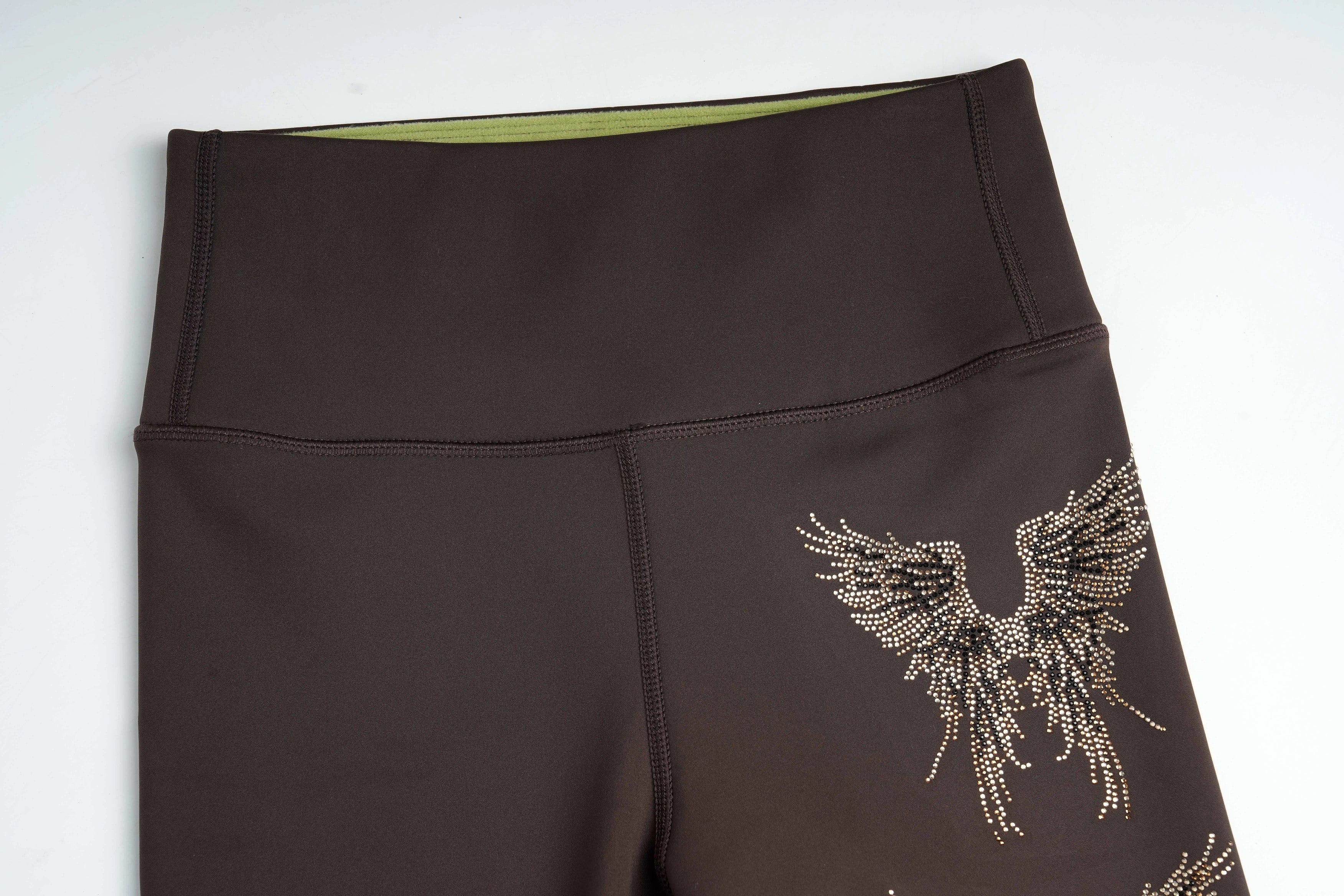 Brown leggings with decorative wings on a white background, TCH Rhinestone Golden Wings Black High-Waist Leggings