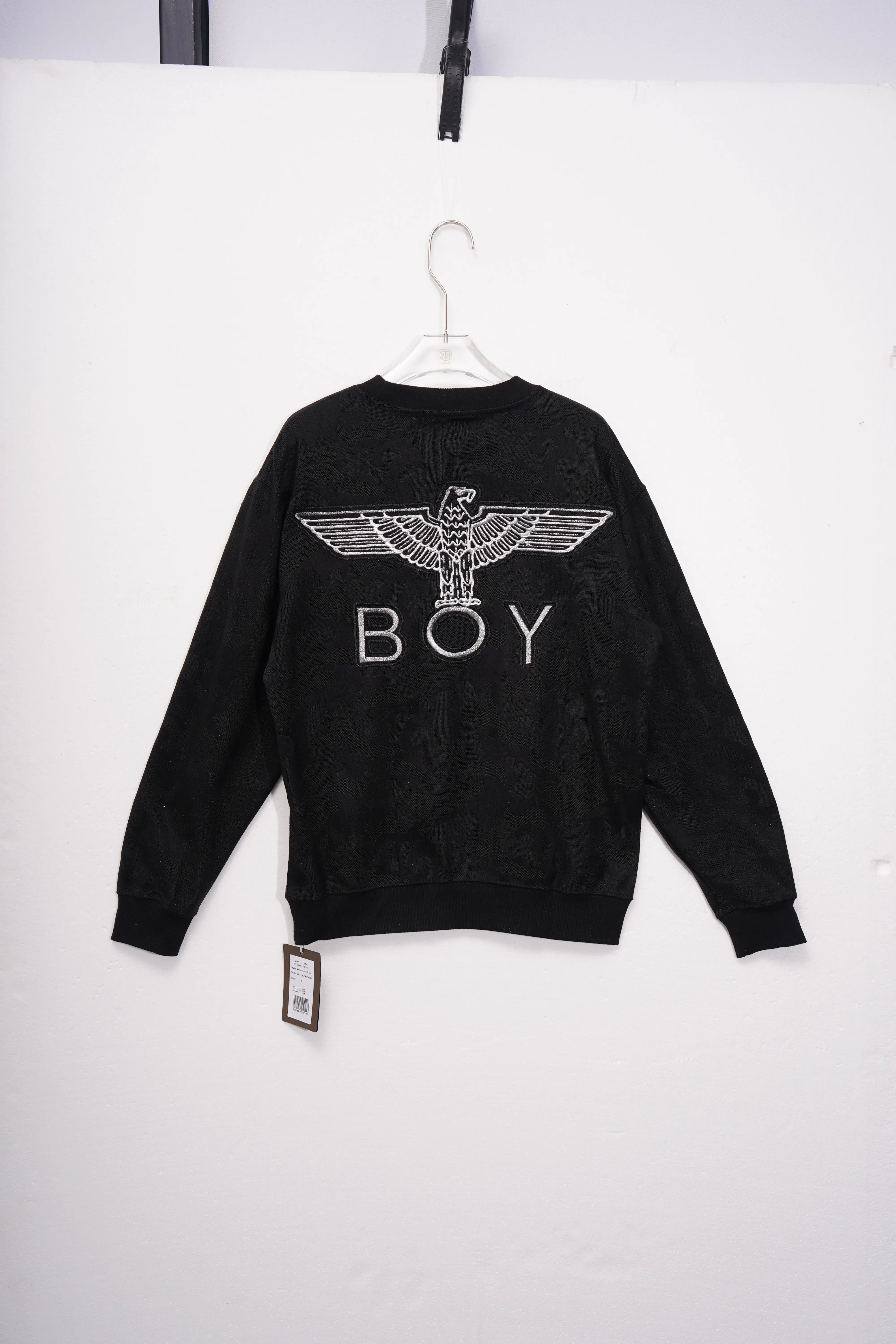 Black sweatshirt with 'BOY' logo on a white background, TCH Rhinestone Golden Wings Sweatshirt
