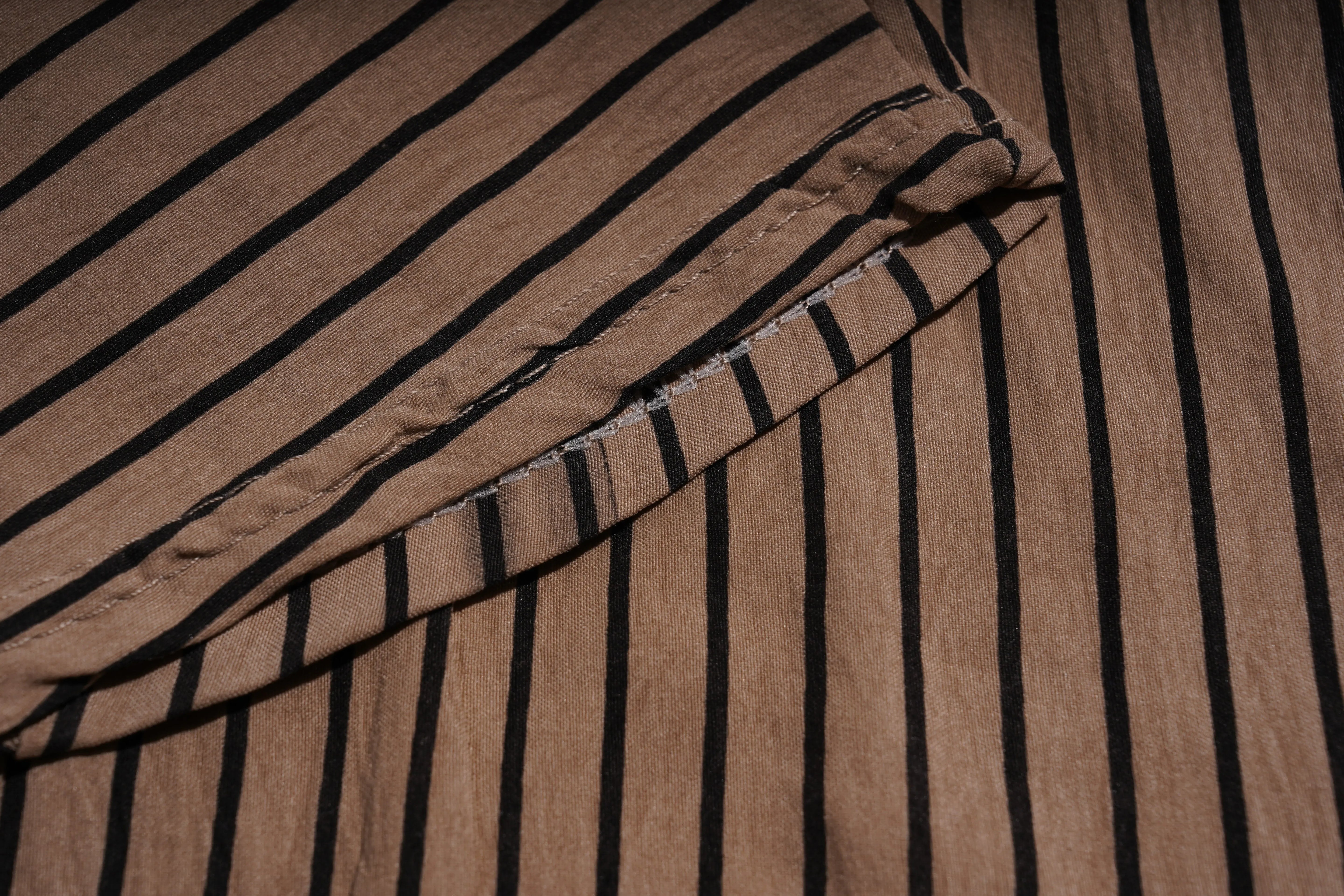 Close-up of brown fabric with black stripes, TCH Rhinestone Graffiti Cat & Cherry Set