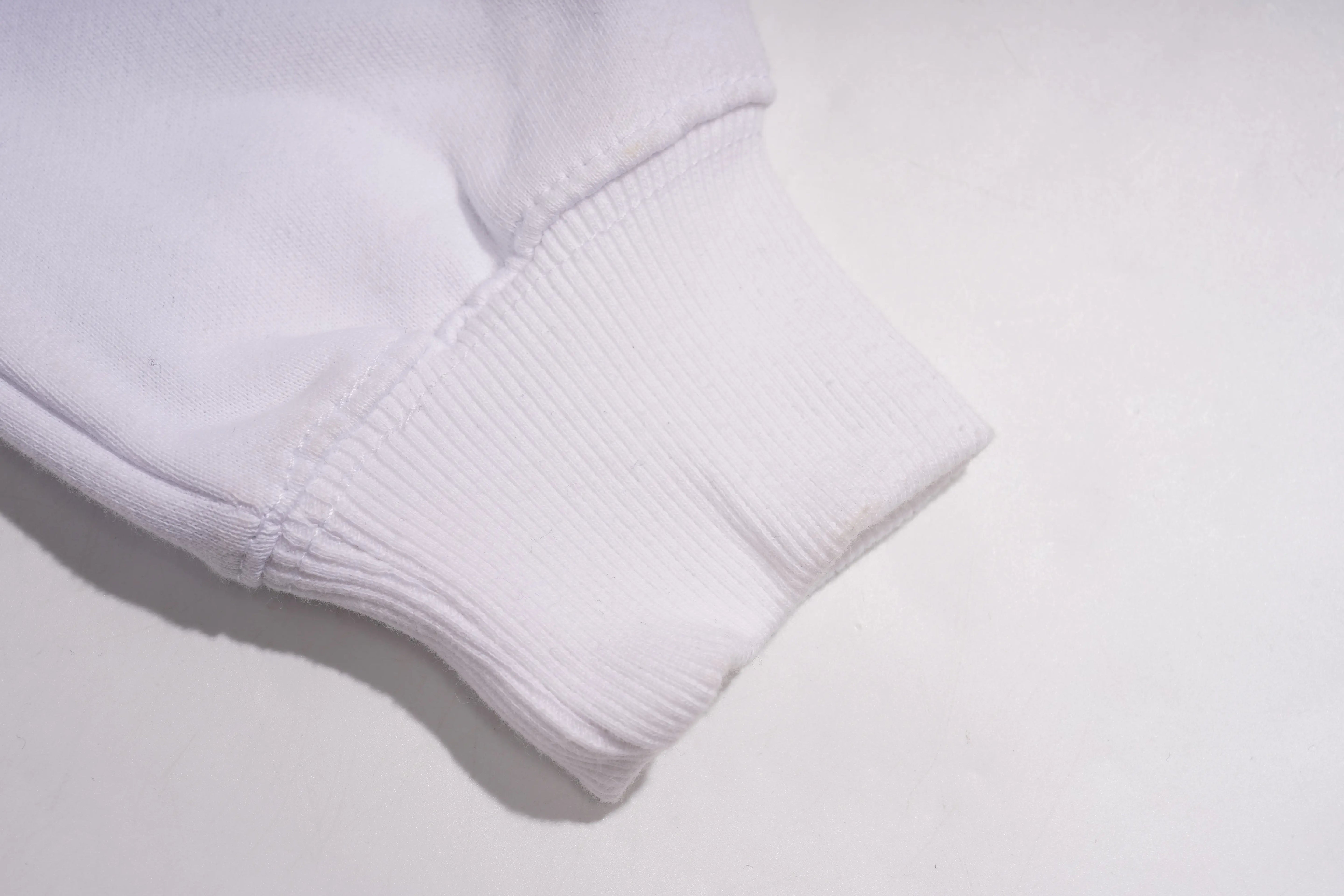 Close-up of a white sock on a light gray background, TCH Rhinestone Hello Kitty BOYLONDON Sweatshirt