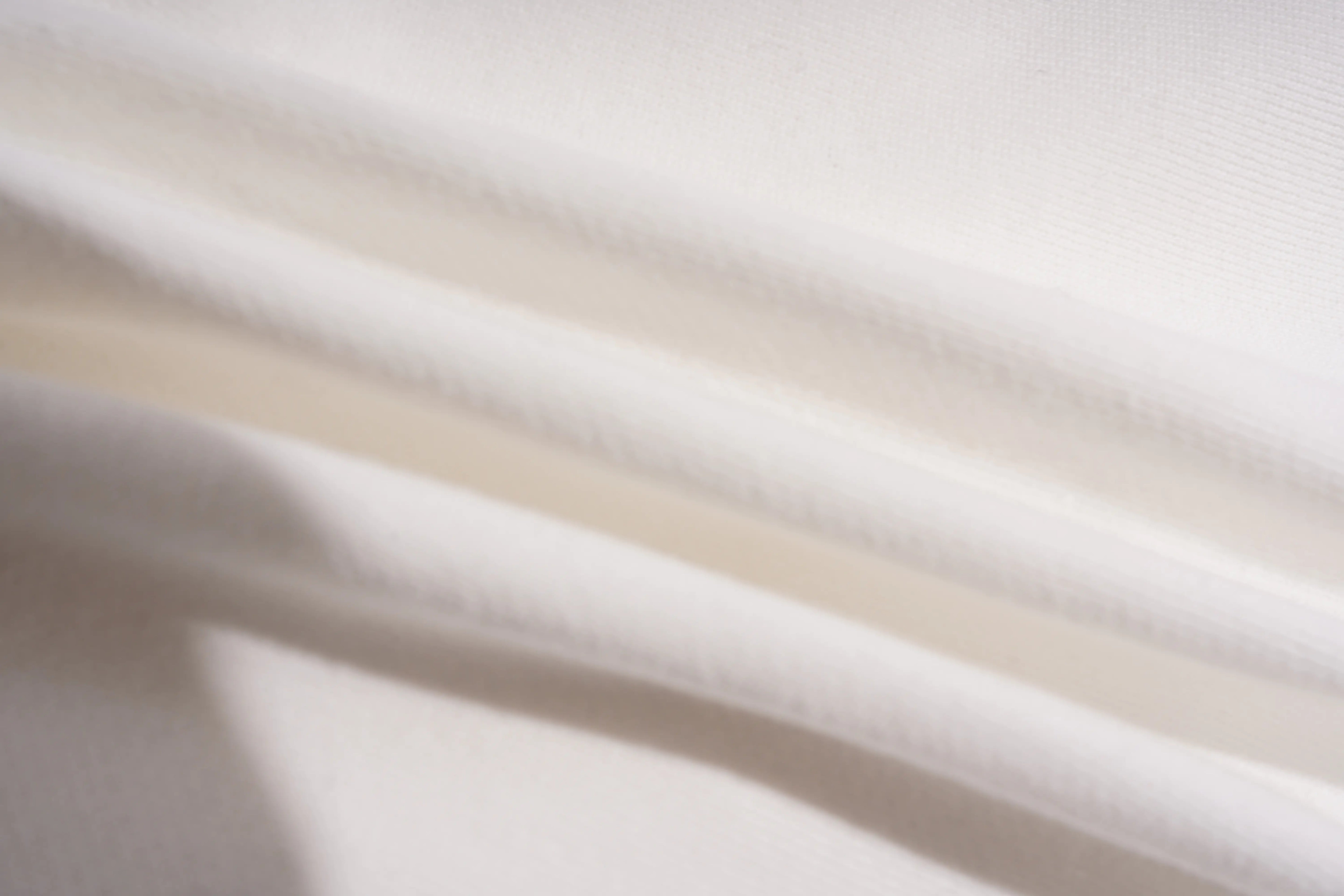Close-up of beige fabric with soft texture