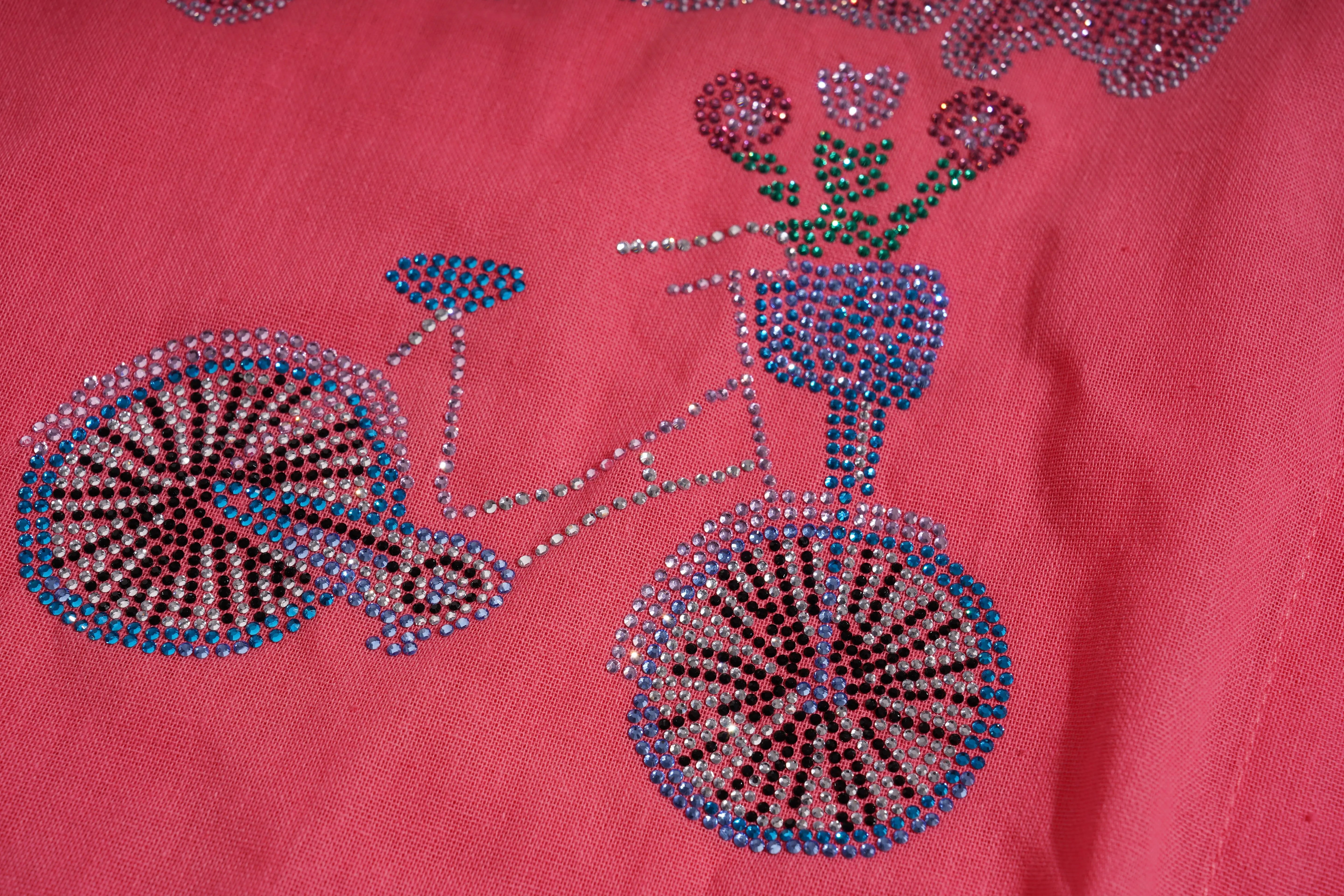 Decorative bicycle design with rhinestones on a red fabric background, TCH Rhinestone Love Lucky Pig Set