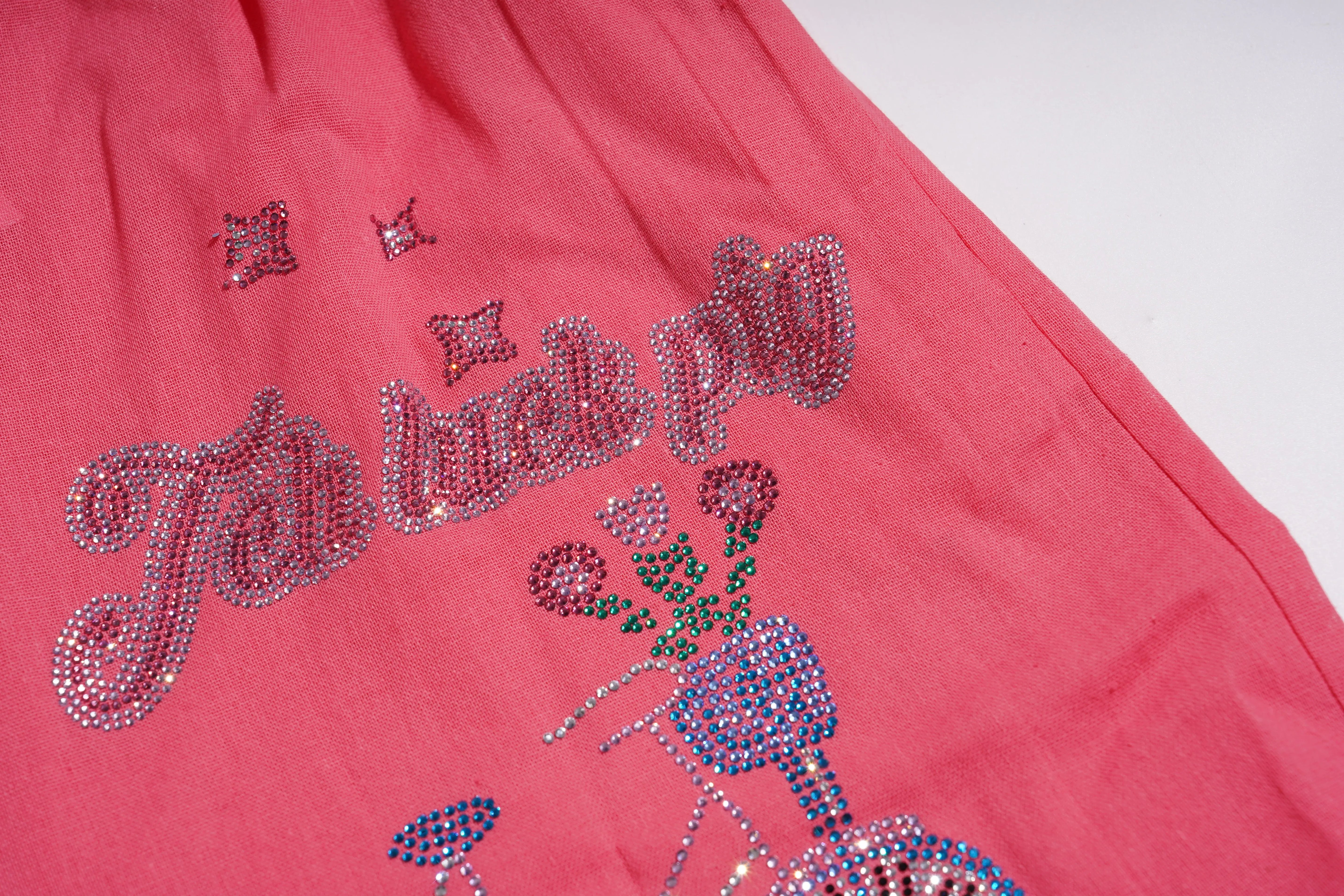 Pink fabric with decorative text and floral design on a white background, TCH Rhinestone Love Lucky Pig Set