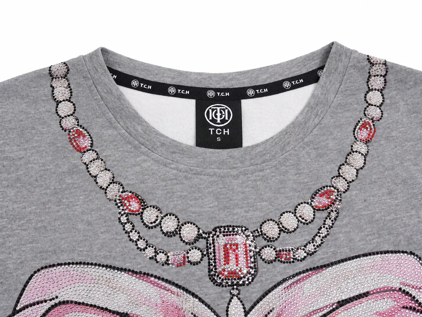 Close-up of a heather gray TCH t-shirt featuring a large, detailed beaded graphic of a necklace and open book in pink, white, and black. TCH Rhinestone Pearl Corset Graphic Mini Dress