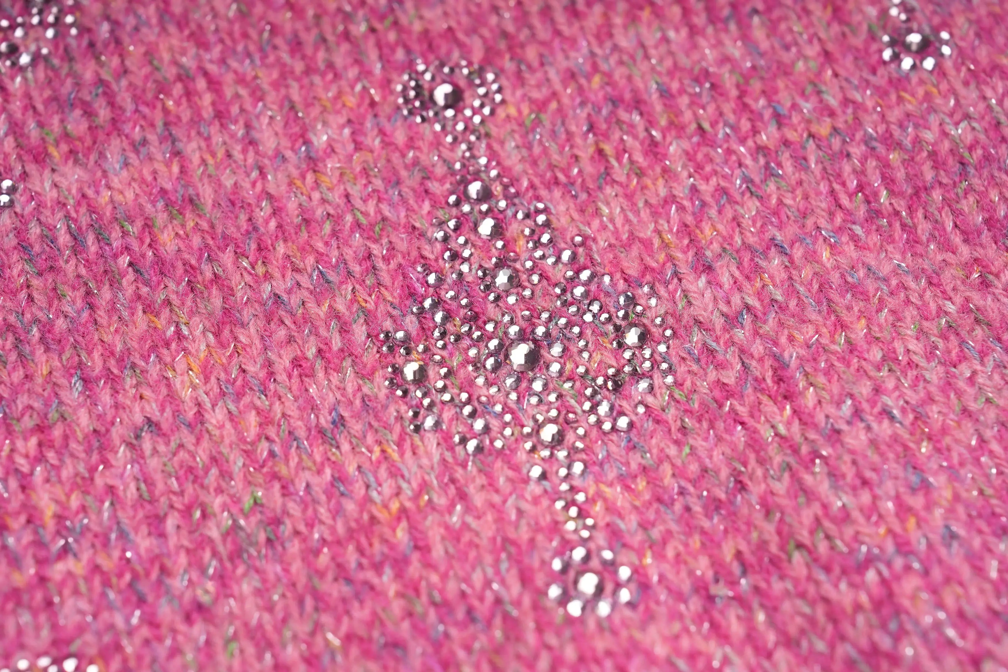Close-up of pink fabric with glittery sequins, TCH Rhinestone Pendant Pattern Pink Knit Cardigan