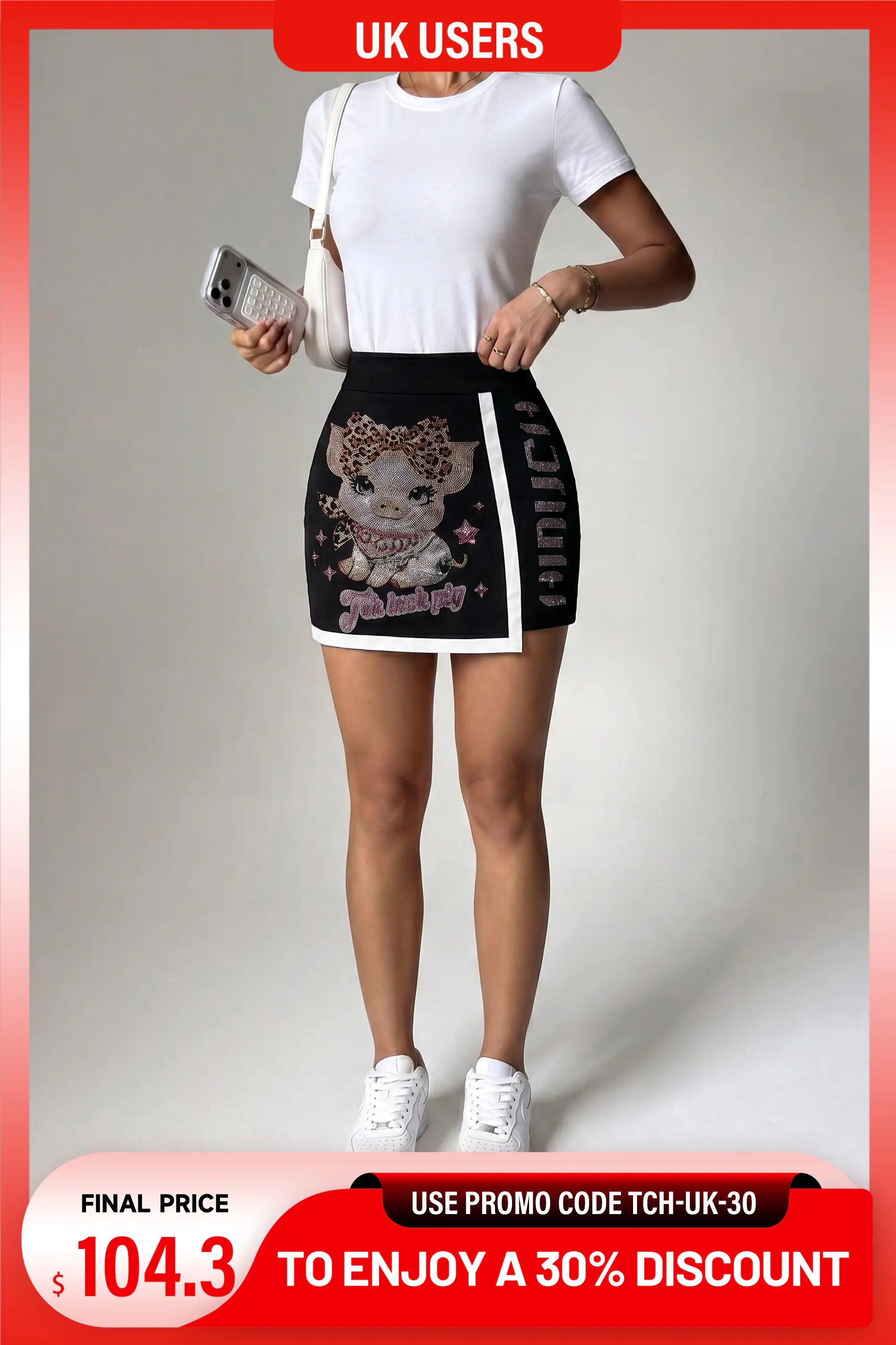 A model wearing a white t-shirt and a black mini skirt with a cartoon cat graphic and white side stripes, standing against a light gray studio background. The image has promotional overlays for UK users with a discount code. TCH Rhinestone Pig Graphic Tennis Skirt