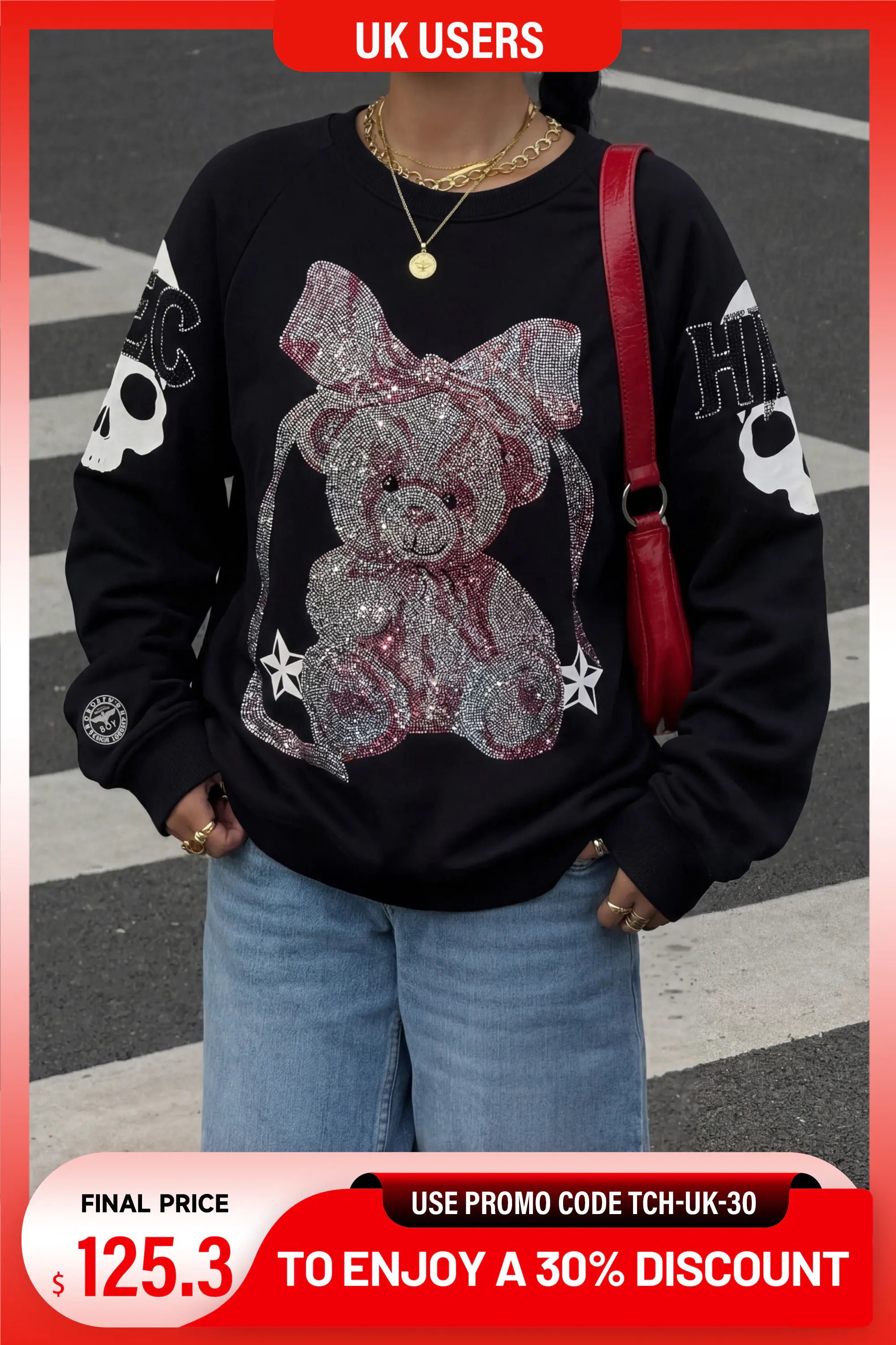 A person wearing a black long-sleeve sweatshirt with a large glittery teddy bear graphic on the front, paired with light blue jeans and a red shoulder bag. The image has promotional text banners at the top and bottom. TCH Rhinestone Pink Bear Skull Sleeve Sweatshirt