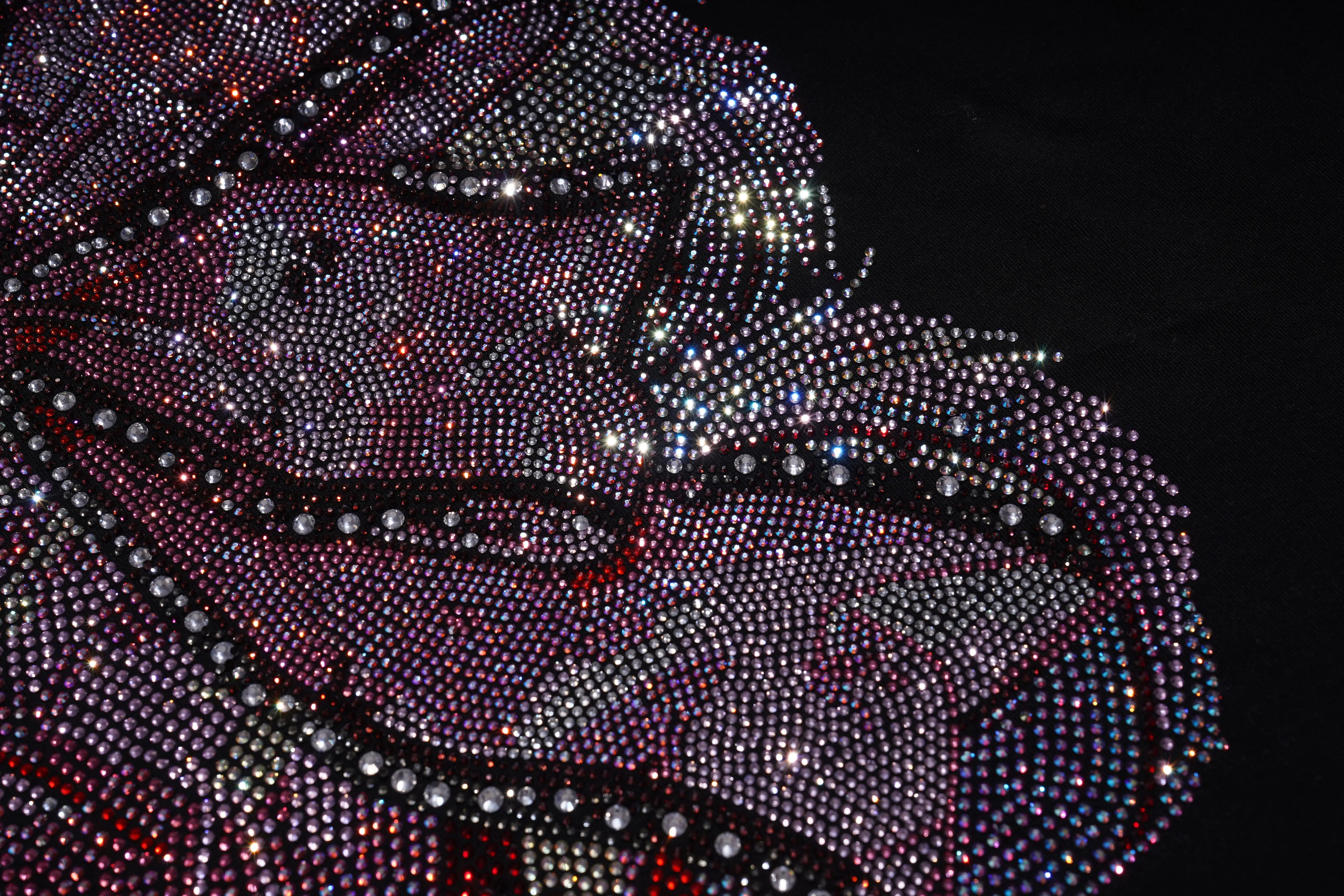 Close-up of a face made from rhinestones on a black background, TCH Rhinestone Pink Teddy Bear T-Shirt