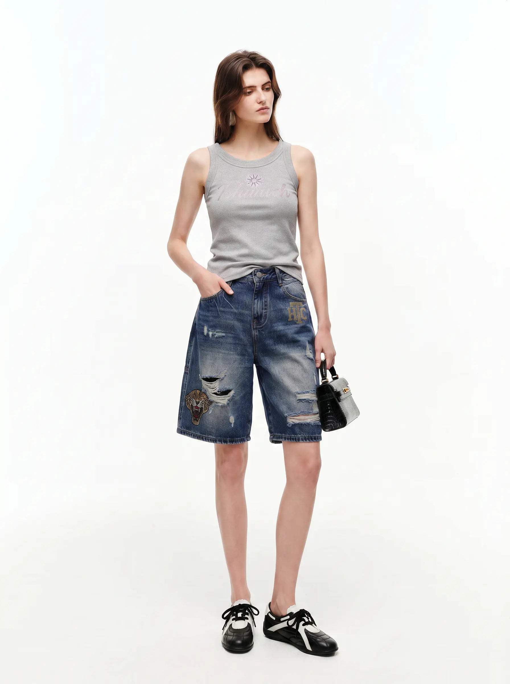 Woman wearing a gray tank top and blue denim shorts on a white background, TCH Rhinestone Signature Ribbed Tank Top