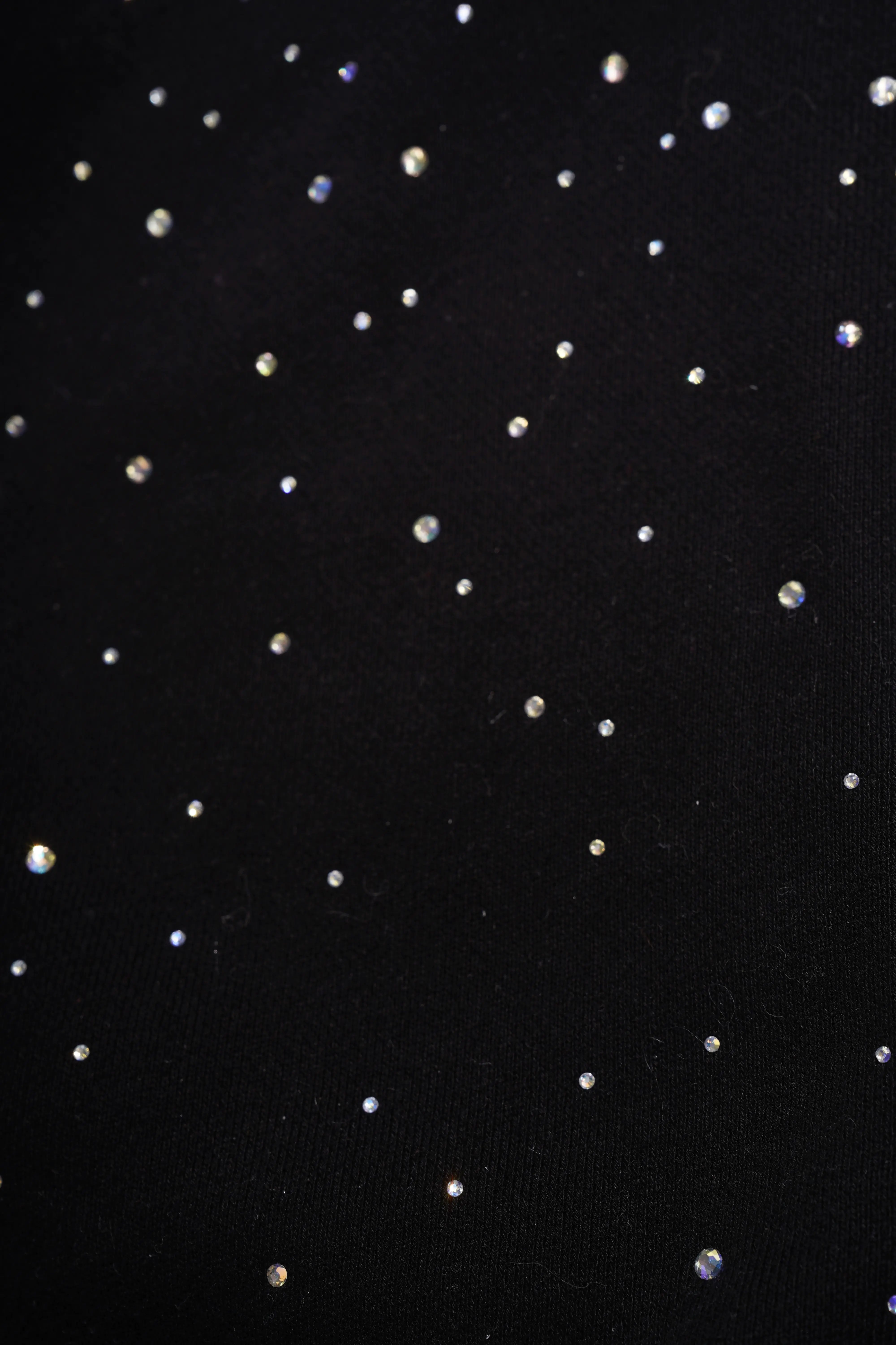 Black fabric with small white dots on a black background, TCH Rhinestone Starry Sky Lion Hoodie