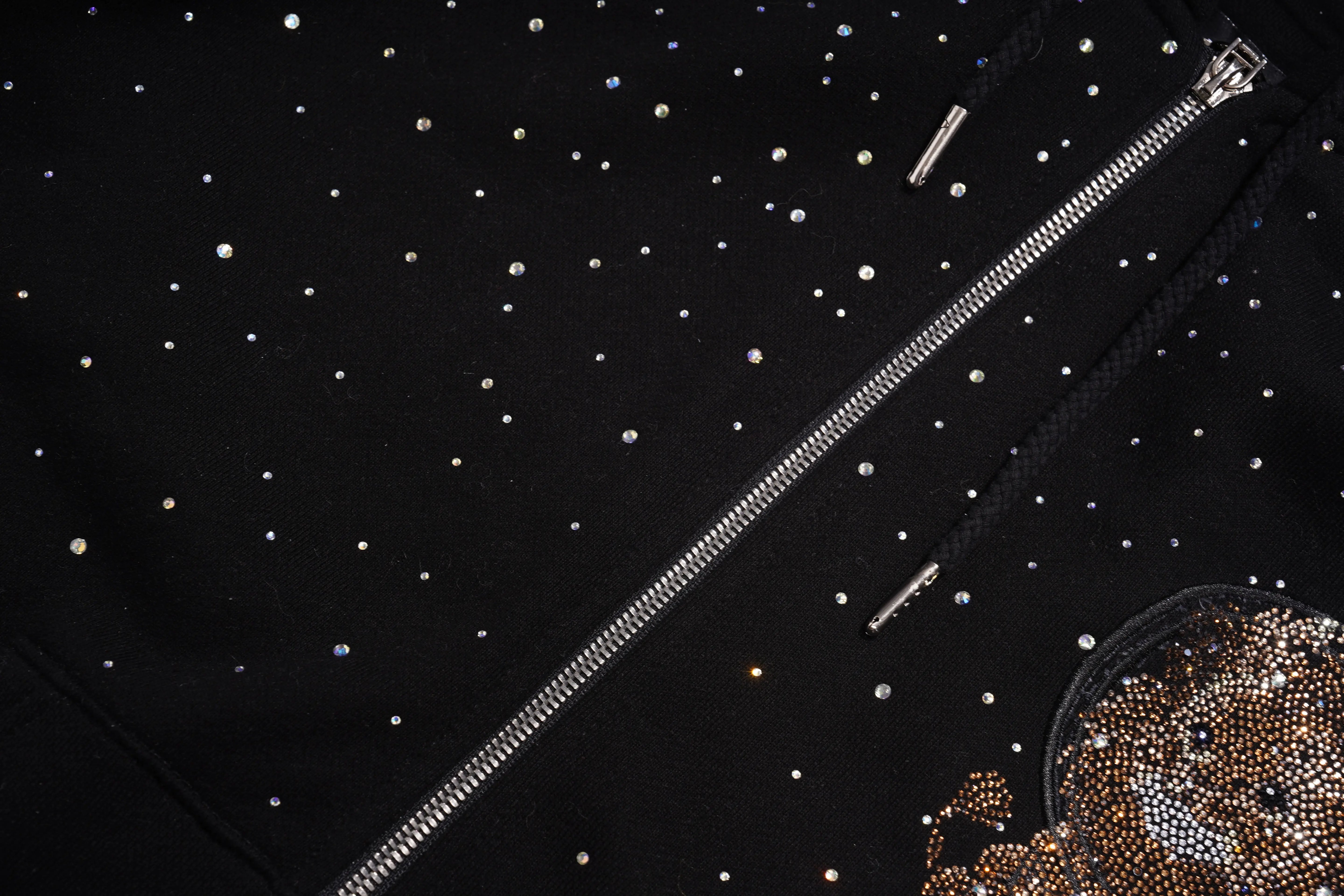 Black fabric with silver zipper and embellishments, TCH Rhinestone Starry Sky Lion Hoodie