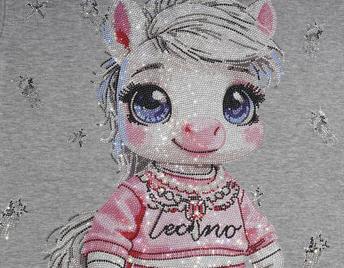 A close-up of a gray heathered fabric featuring a large, detailed rhinestone-style illustration of a cartoon pony with blue eyes, pink cheeks, and a pink striped sweater with the word 'Techno' on the front. TCH Rhinestone Techno Unicorn Graphic T-Shirt
