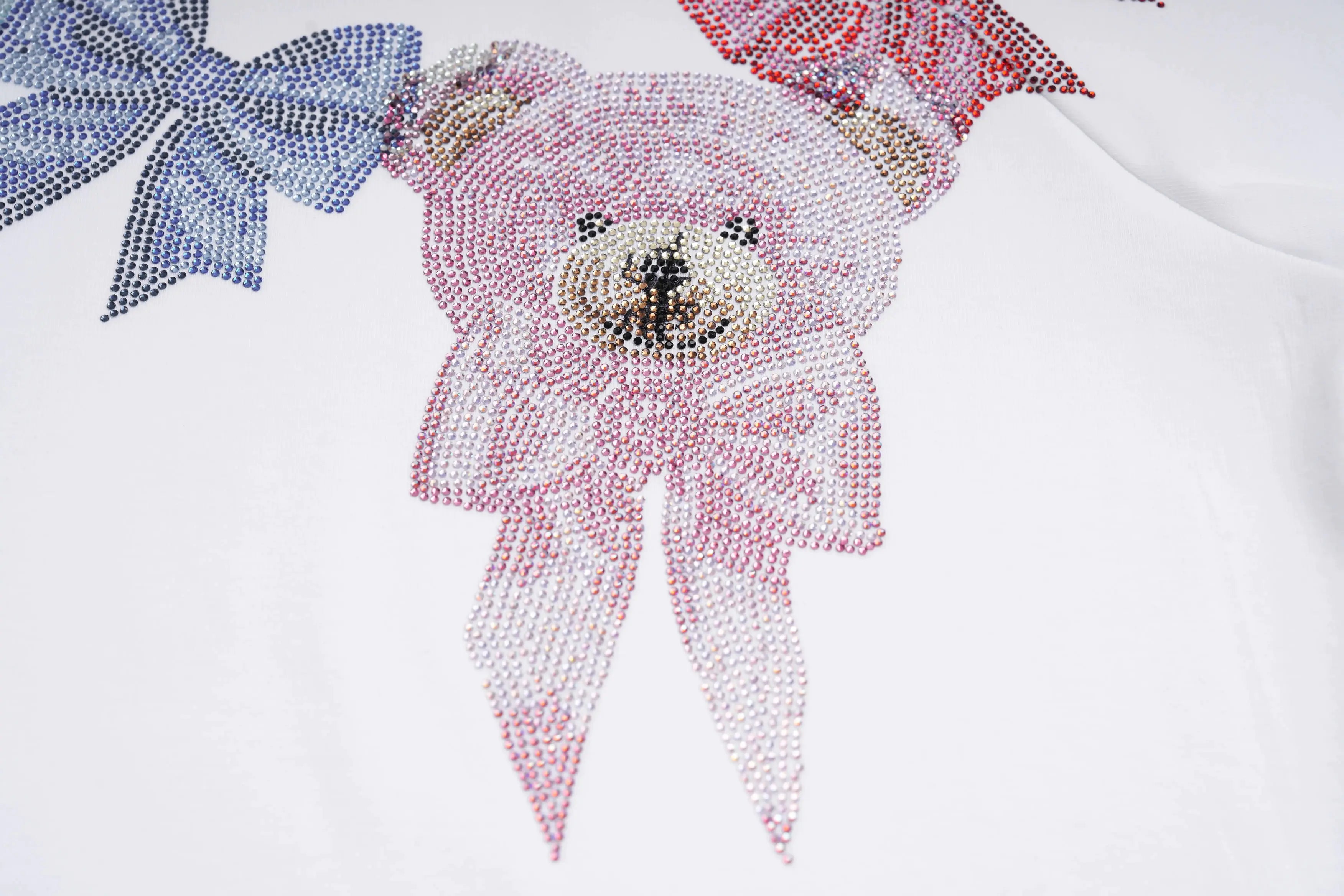 Close-up of a teddy bear and bow design on a white background, TCH Rhinestone Teddy Bear & Bow Graphic T-Shirt
