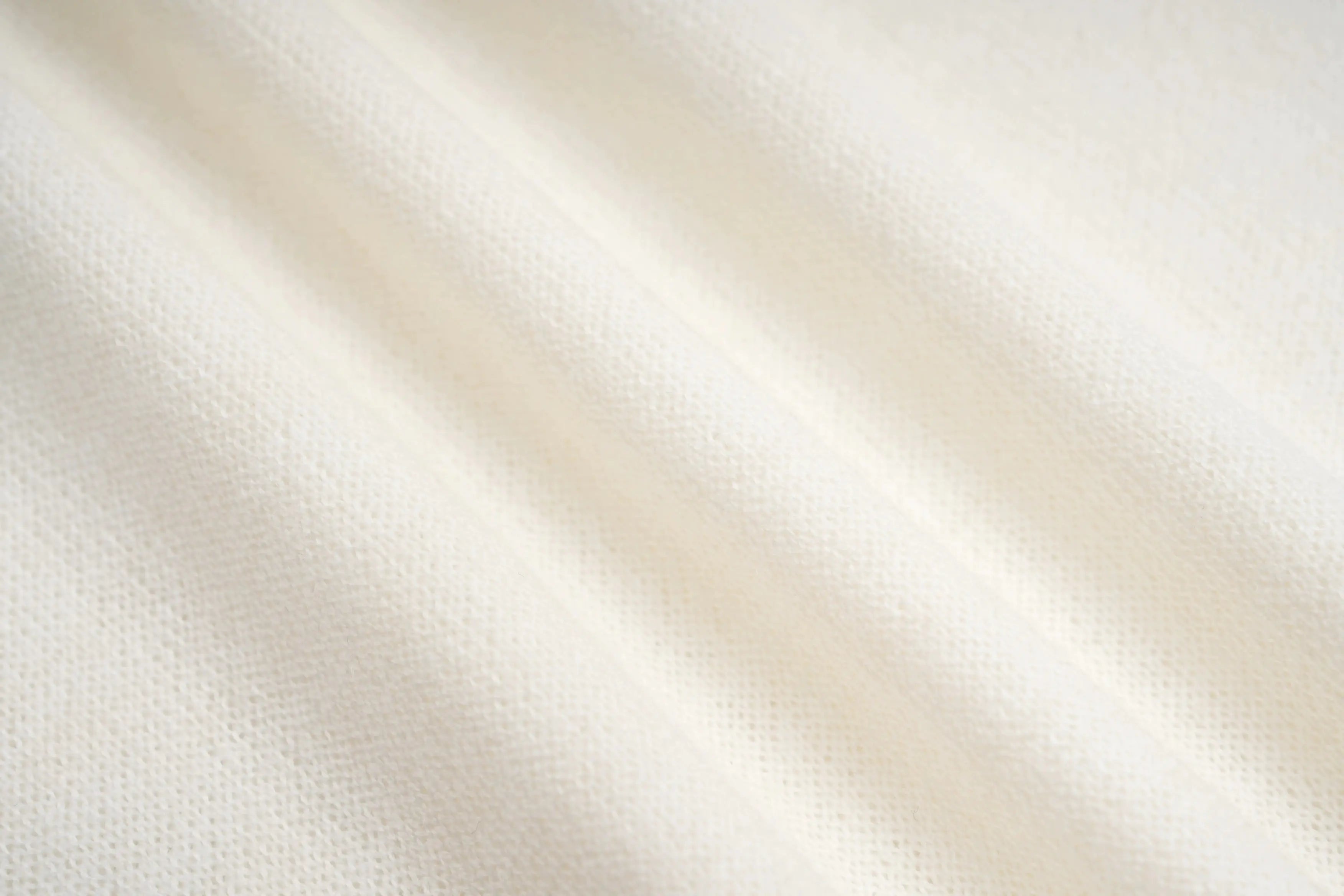 Close-up of a textured white fabric surface, TCH Rhinestone Teddy Bear Hooded Knit Tee