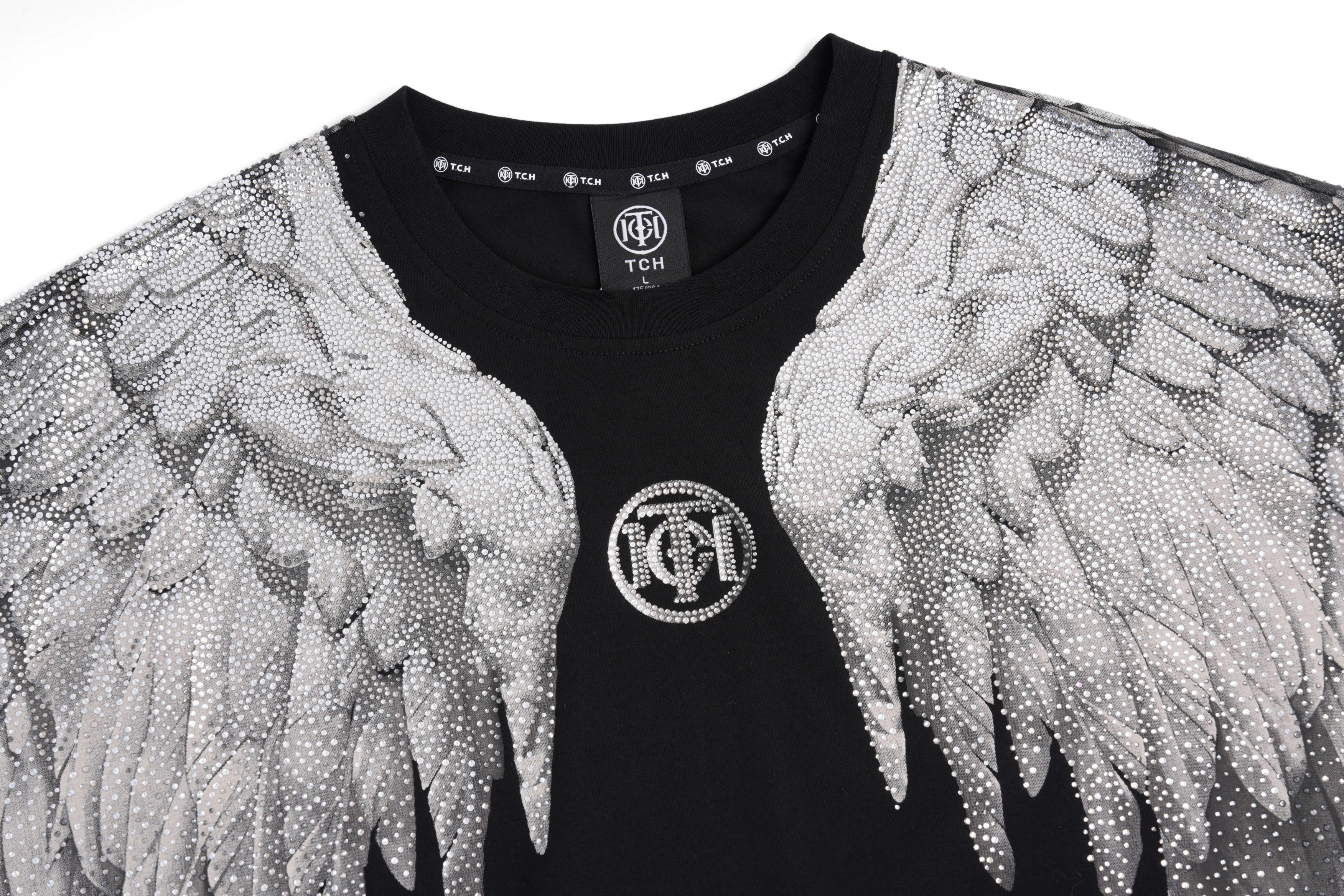 Black t-shirt with silver angel wings design on a white background, TCH Rhinestone Wings Logo Black Graphic T-Shirt