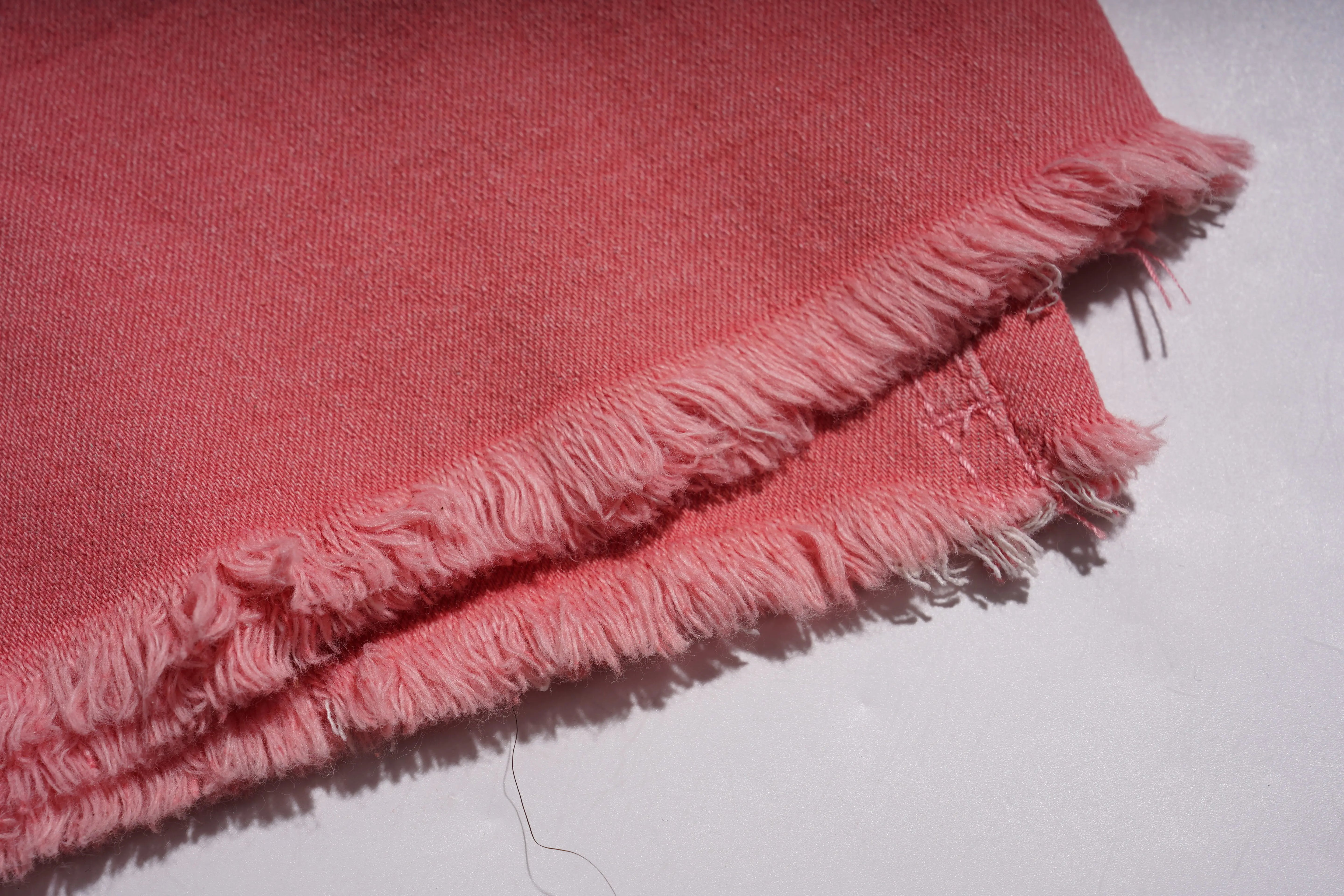 Pink fabric with frayed edges on a white background, TCH Silver Bouquet Rhinestone Pink Denim Jeans