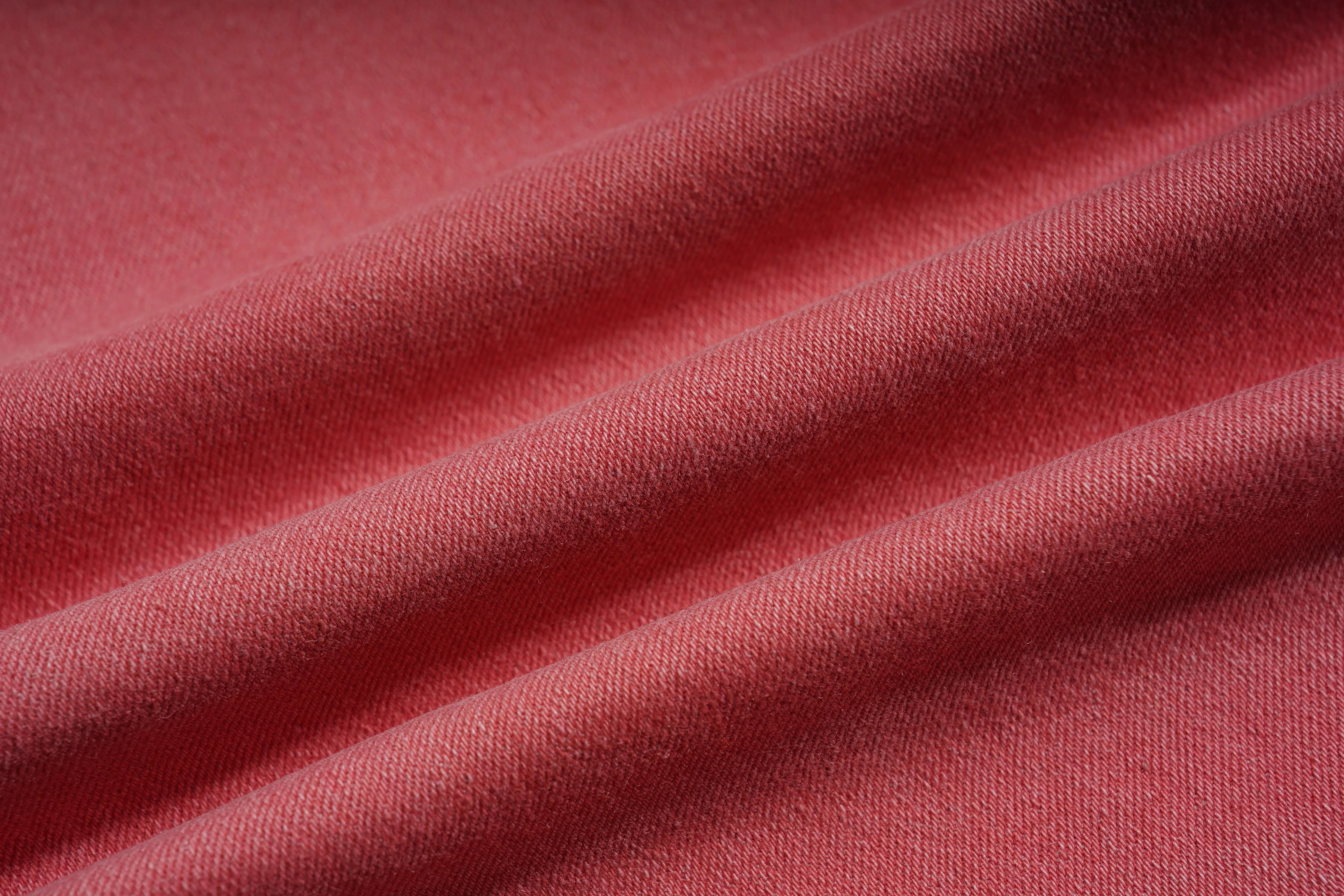 Close-up of red fabric with visible texture, TCH Silver Bouquet Rhinestone Pink Denim Jeans
