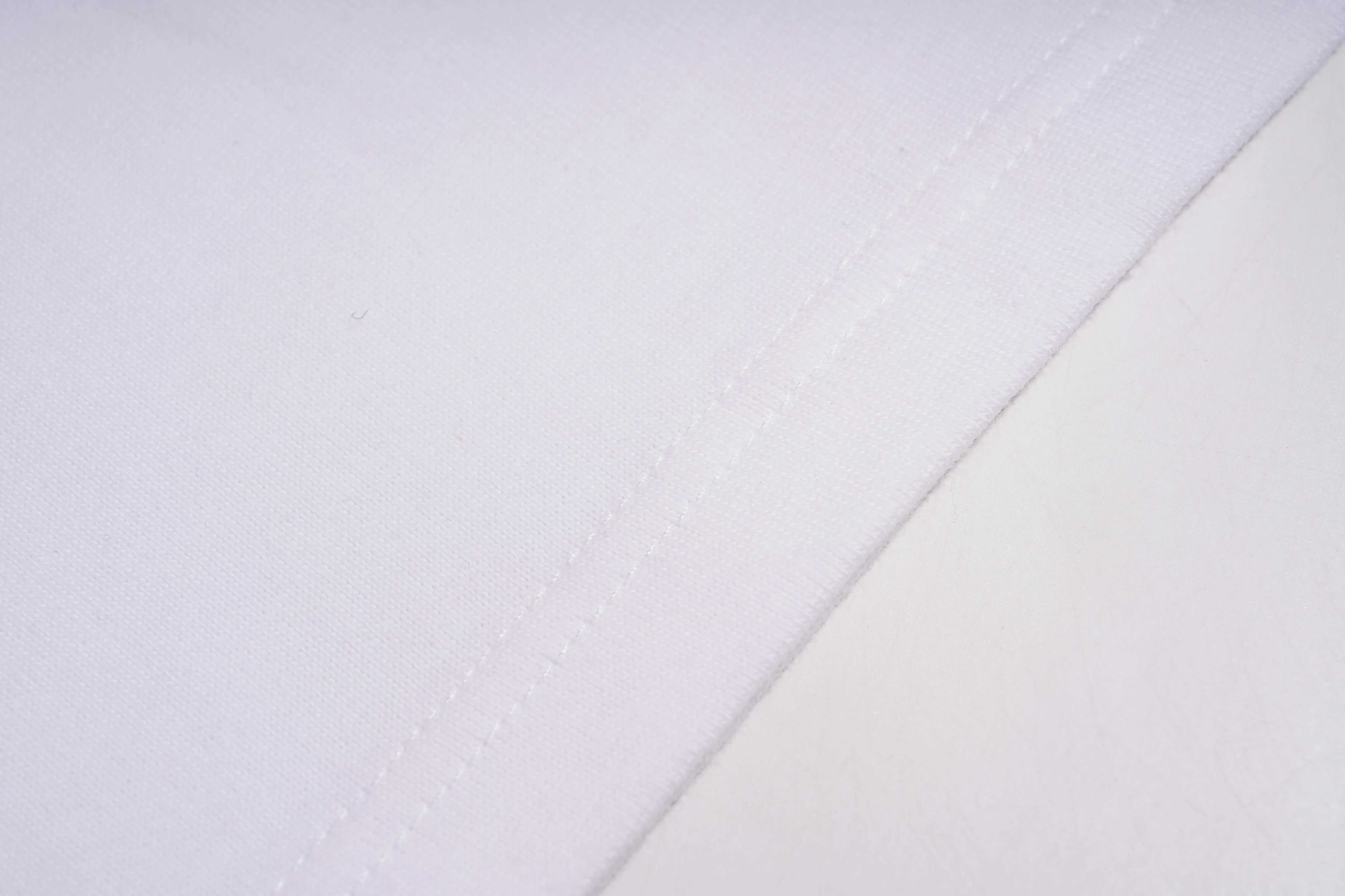 Two white fabrics with a textured pattern on a light gray background, TCH TECHNO Rhinestone Layered Typography T-Shirt
