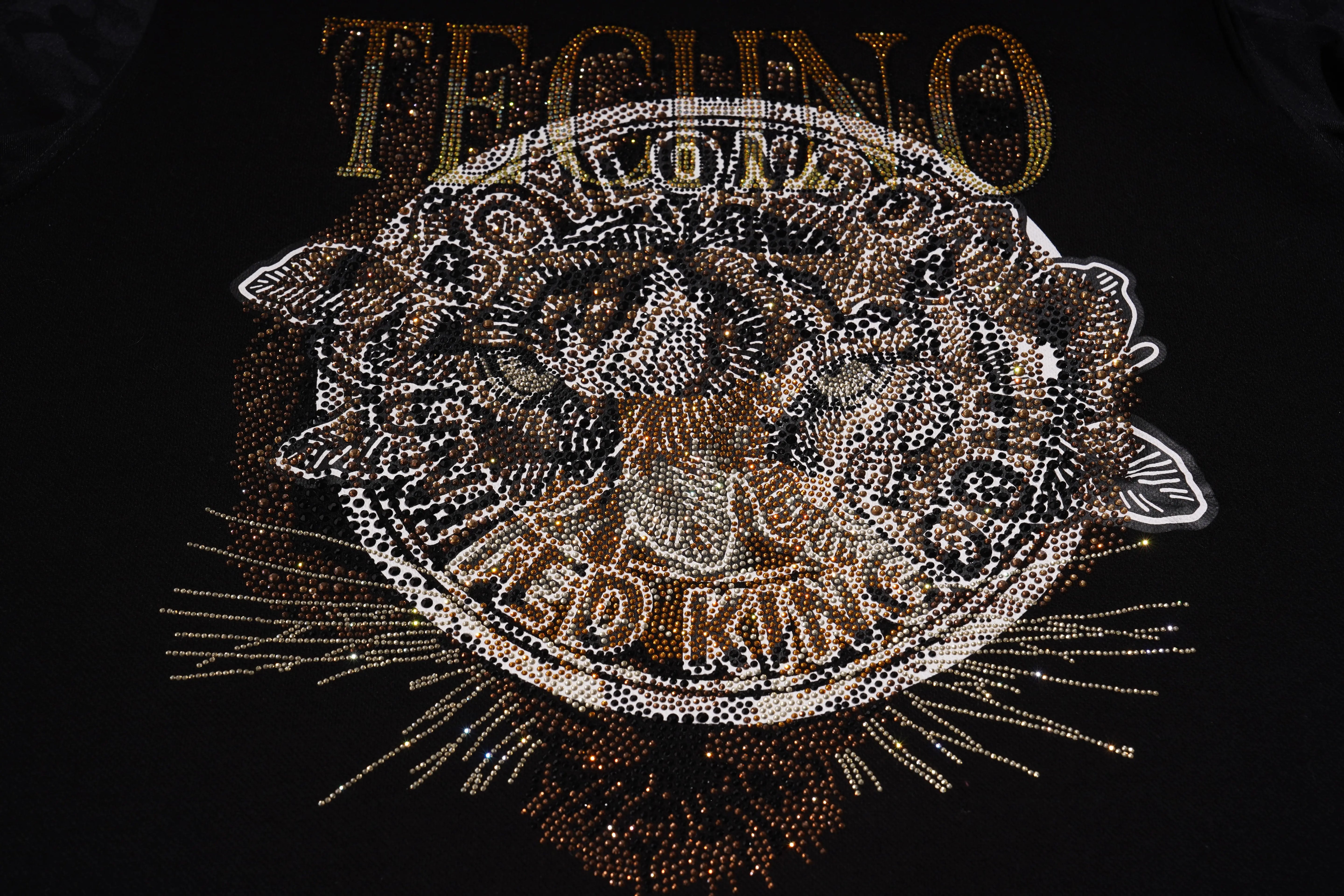 Decorative tiger emblem with 'Techno' text on a black background, TCH Techno Rhinestone Graphic Oversize T-Shirt