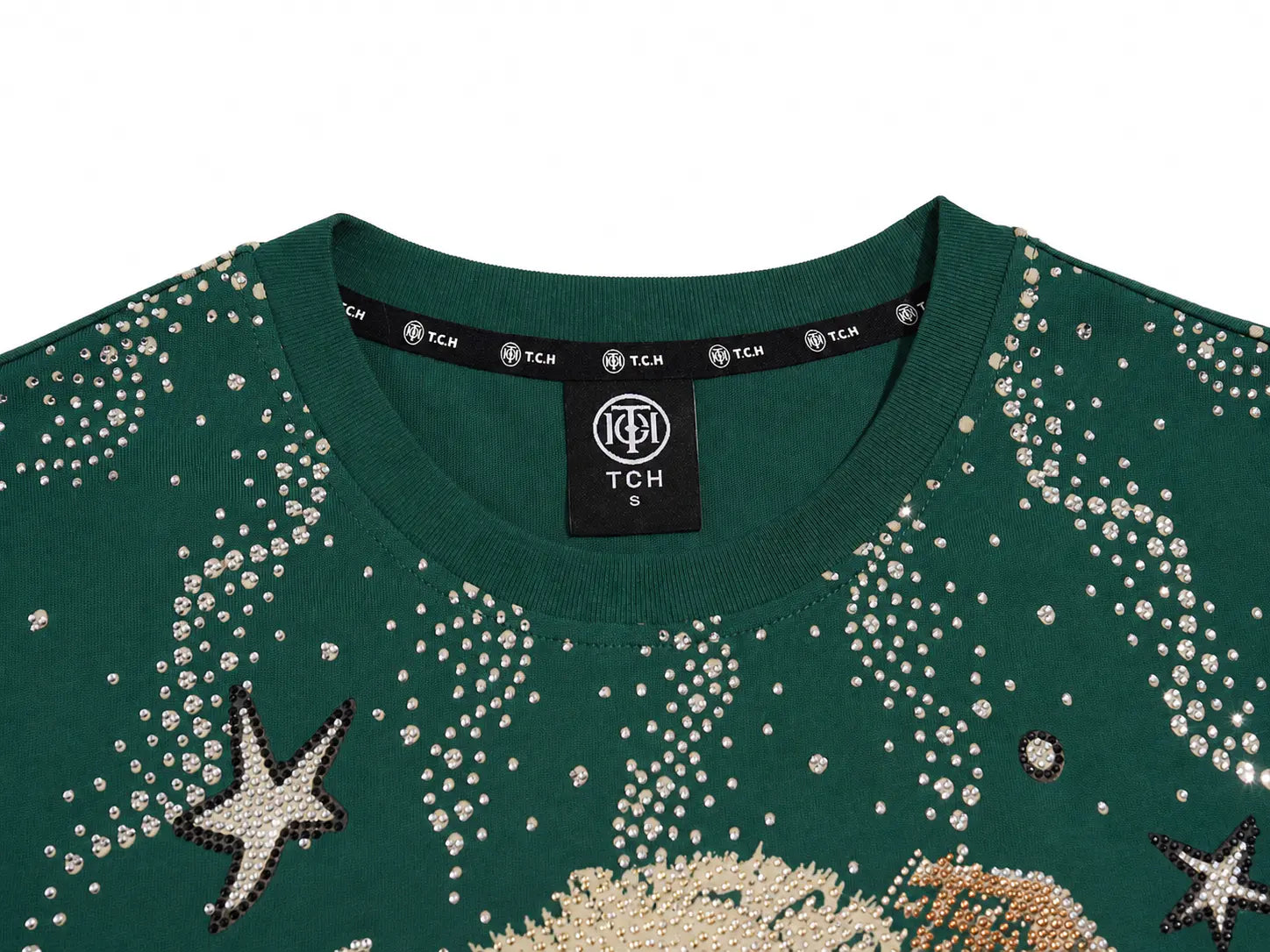 Close-up of a dark green crewneck sweatshirt featuring rhinestone starfish and galaxy patterns, with a black neck label showing the TCH brand. TCH Teddy Bear Rhinestone Graphic T-Shirt