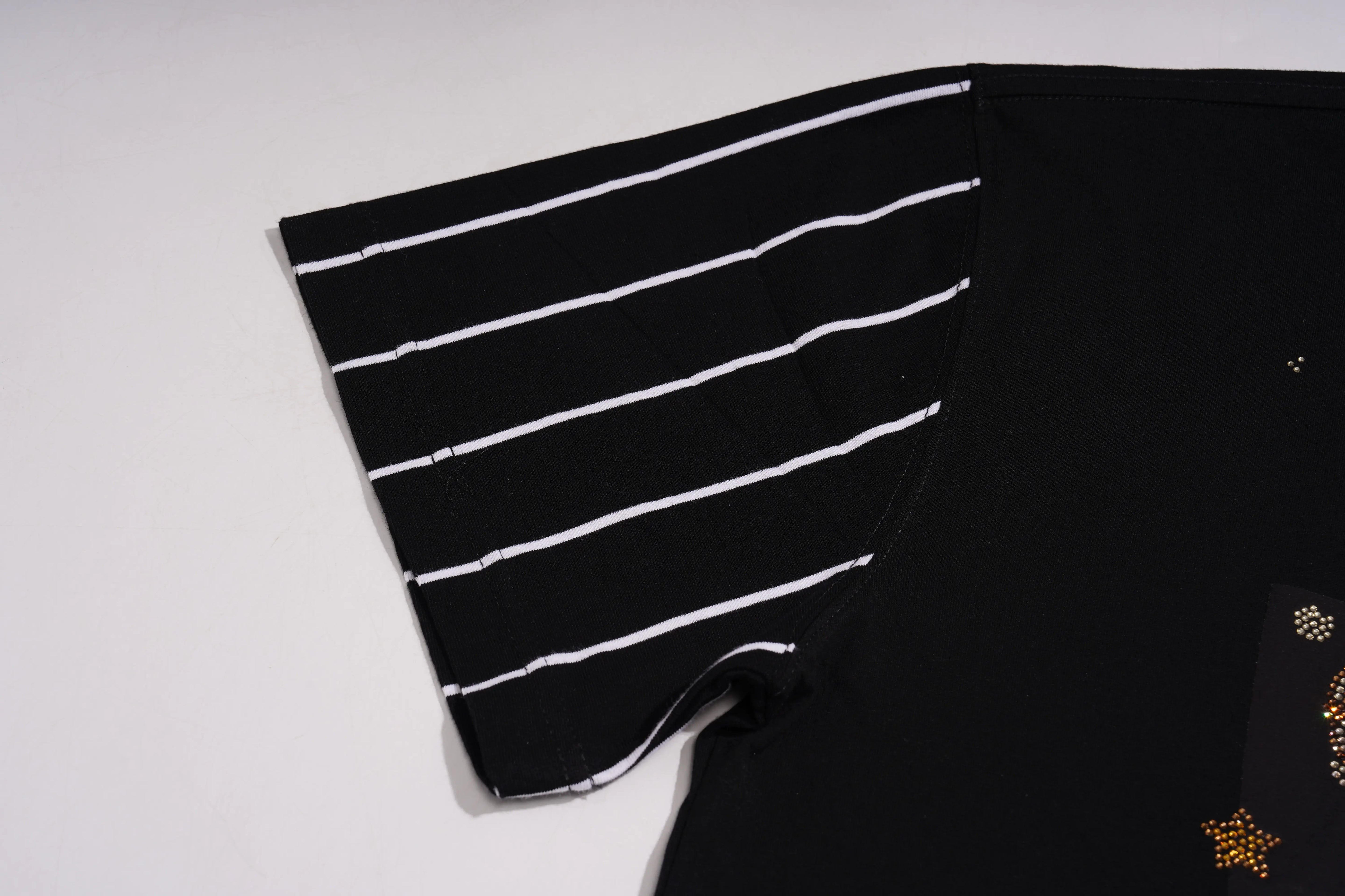 Black fabric with white stripes on a light gray background, TCH Teddy Bear & Stars Rhinestone T-Shirt
