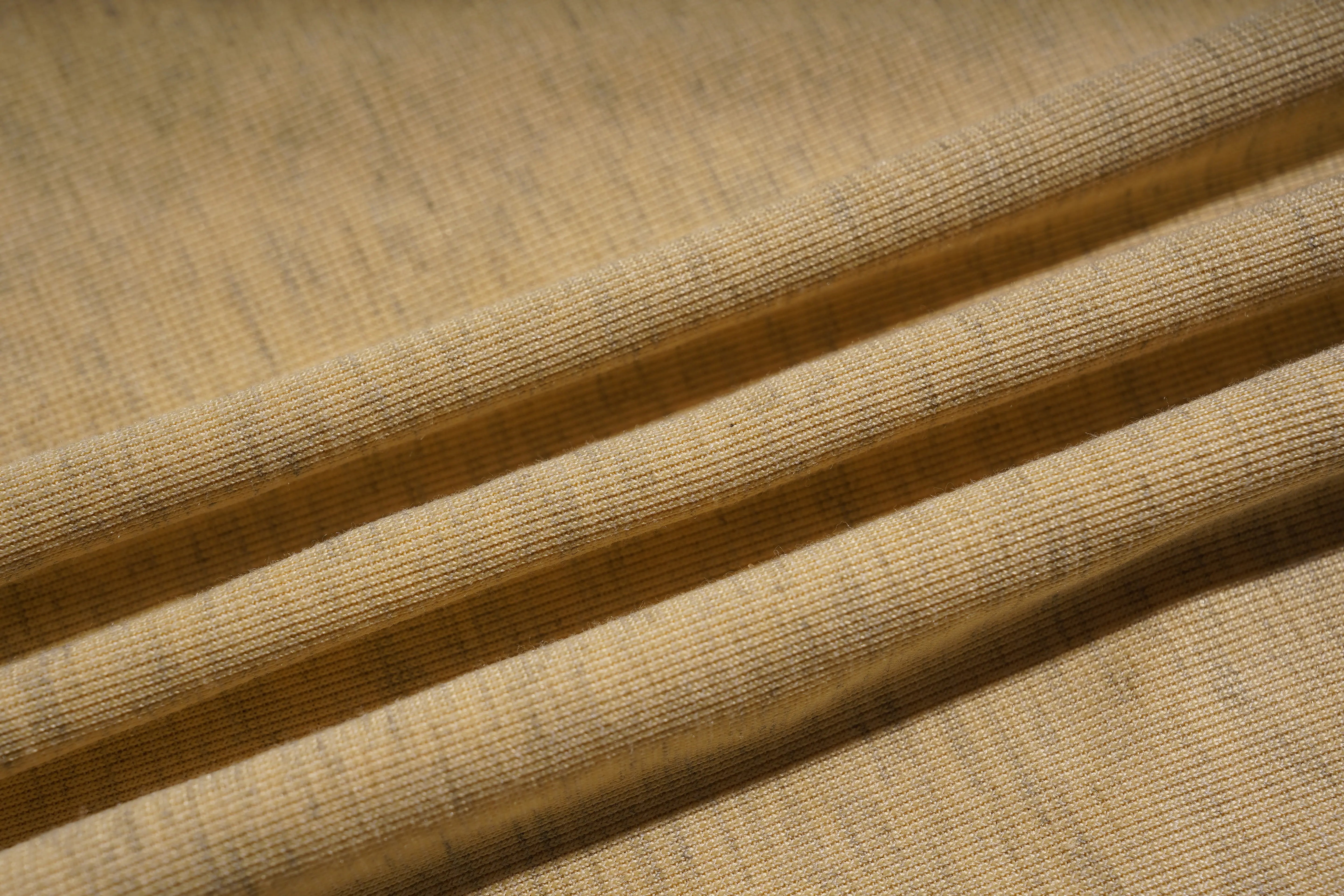 Close-up of beige fabric with a textured pattern, TCH Yellow Butterfly Pajama Set