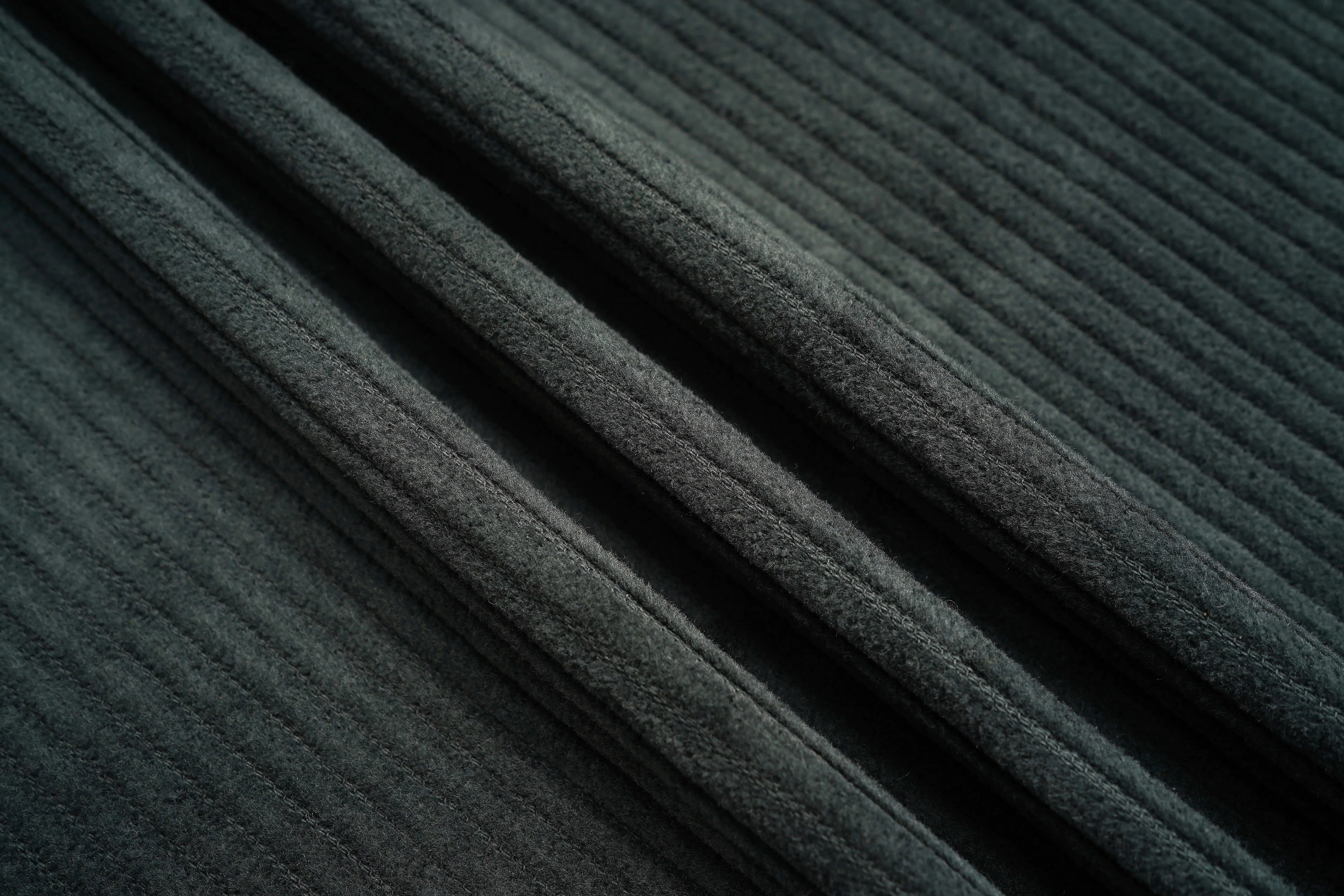 Close-up of dark gray fabric with a textured pattern, TCH All-Over Rhinestone Pendant Dark Grey Jogger Pants