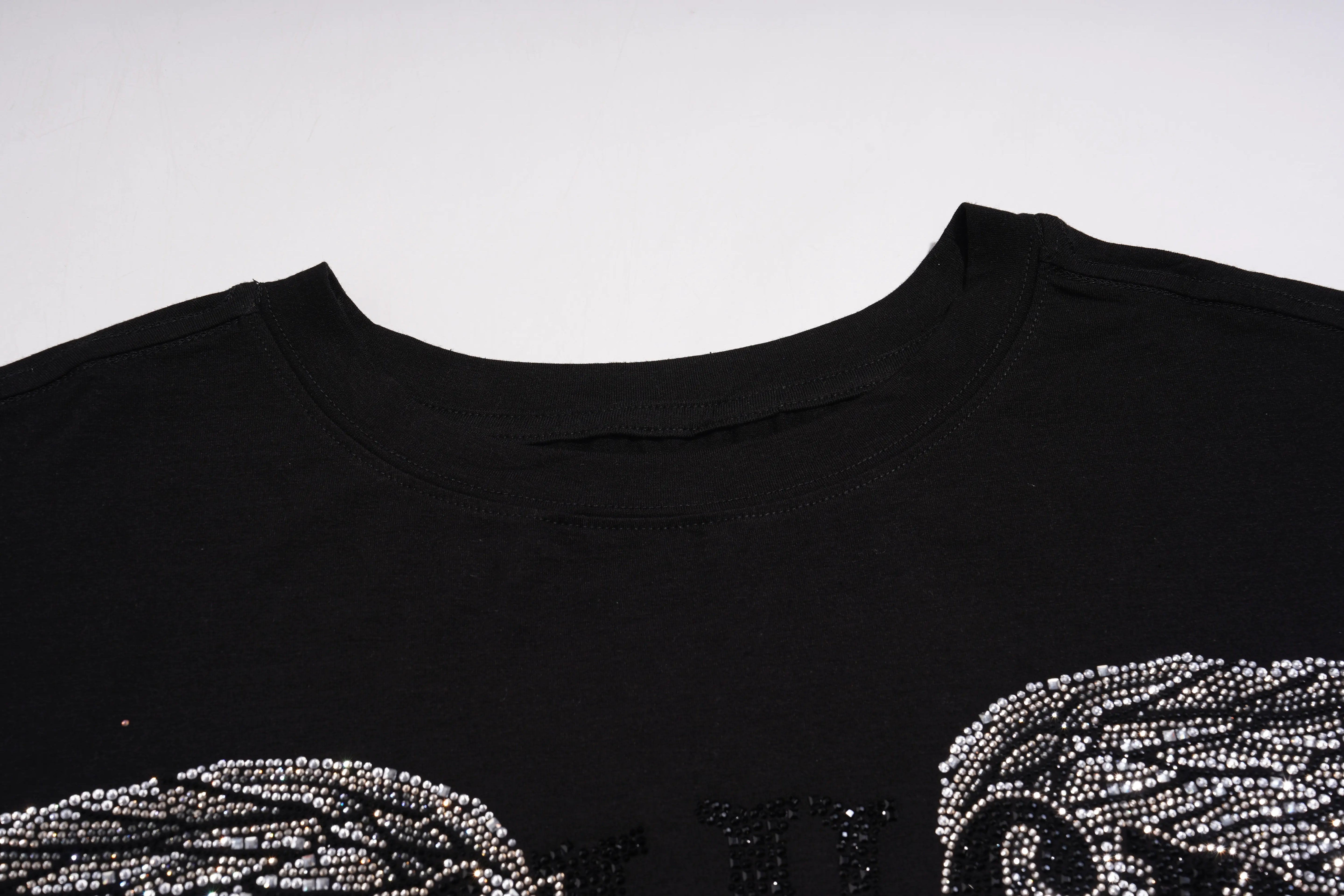 Black t-shirt with rhinestone wings on a white background, TCH Angel Wings Rhinestone Oversized T-Shirt