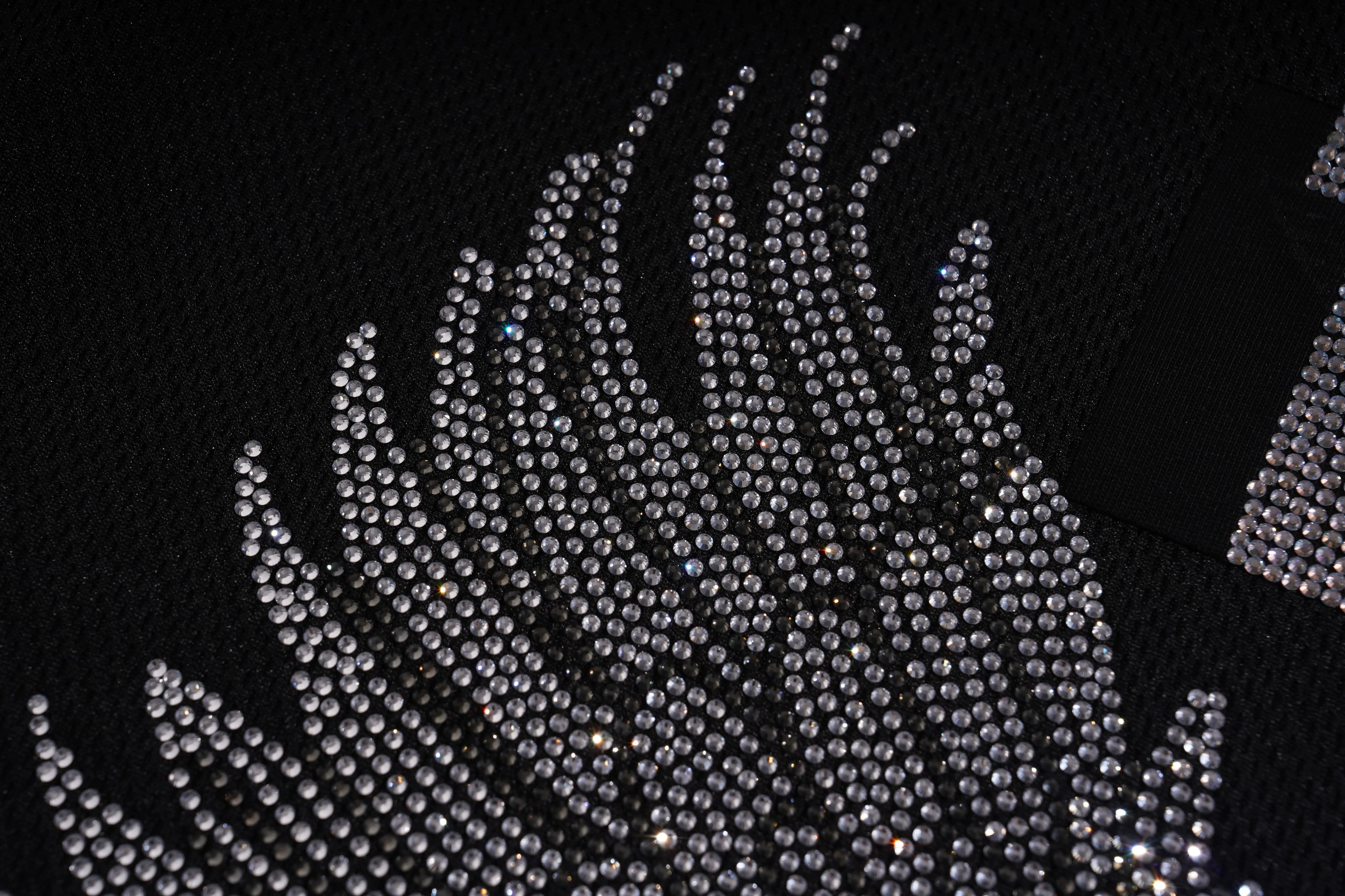 Close-up of a decorative design with rhinestones on a black background, TCH Angel Wings Rhinestone V-Neck Tee