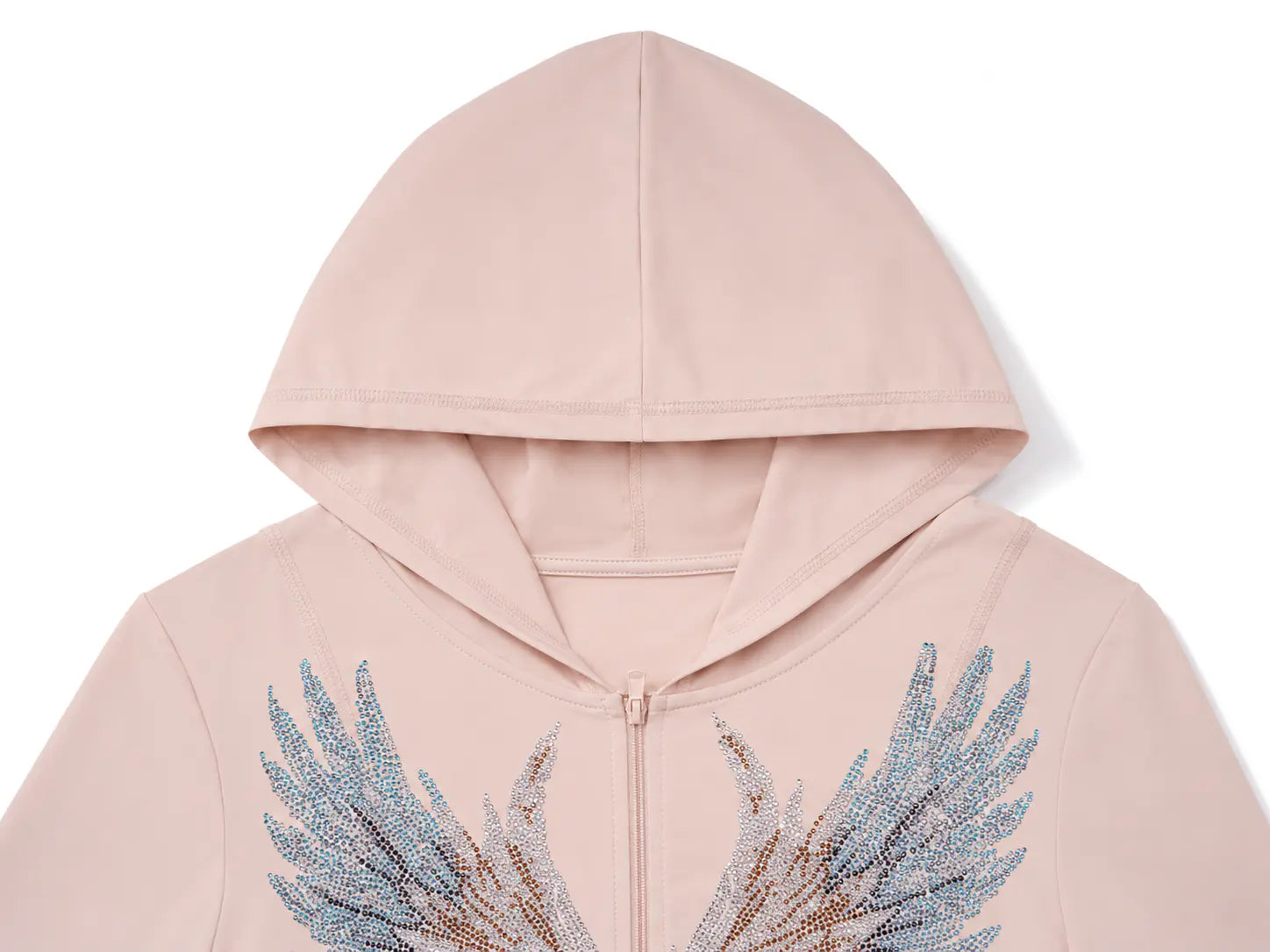 A close-up of a light pink zip-up hoodie with a hood, featuring a large wing graphic on the front made of blue and brown glittery embellishments, set against a plain white background. TCH Angel Wings Rhinestone Zip-Up Hoodie