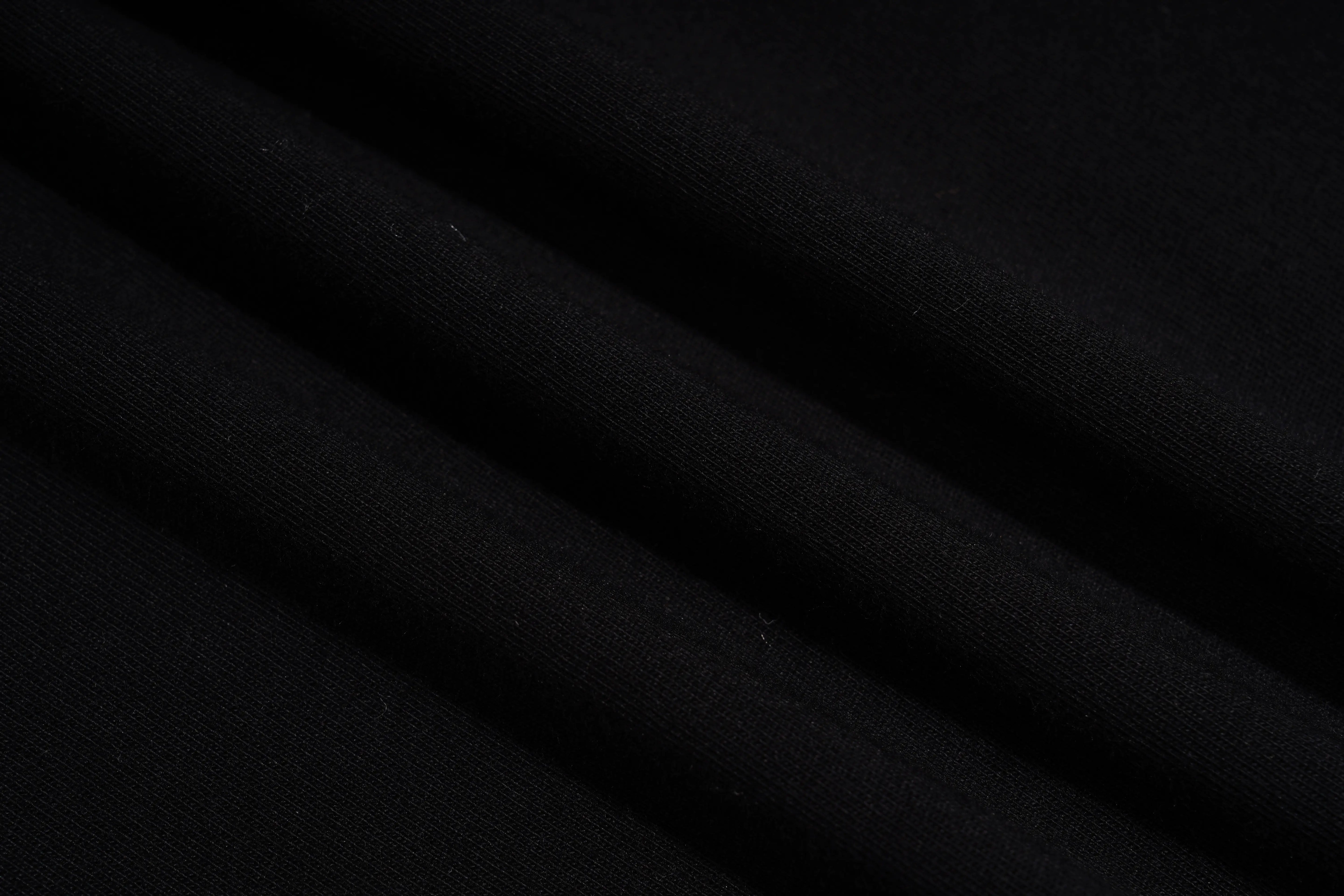 Close-up of black fabric texture, TCH Black Rhinestone Cartoon Pig Sleeveless Top