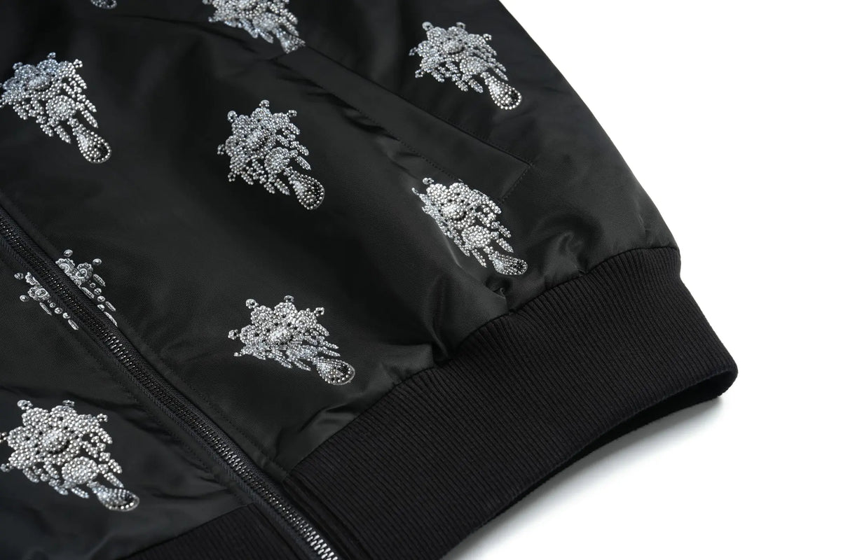 TCH Black Rhinestone Skull Print Bomber Jacket TCH black skull jacket Black skull print bomber jacket Gothic streetwear jacket Silver skull graphic jacket Black graphic bomber jacket All-over print black jacket Alternative fashion bomber jacket Skull pattern zip-up jacket Gothic black streetwear jacket TCH graphic bomber jacket