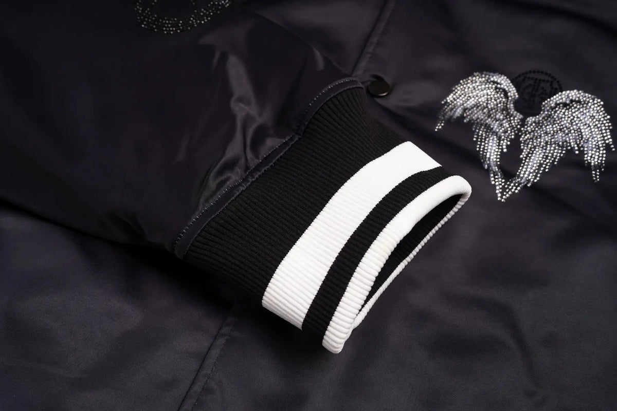 TCH Black Teddy Bear Graphic Satin Varsity Jacket TCH teddy bear varsity jacket Black teddy bear jacket Graphic satin varsity jacket Black streetwear bomber jacket Teddy bear graphic jacket Gothic graphic varsity jacket Black satin-look bomber jacket Angel wings graphic jacket Black snap-button varsity jacket TCH graphic bomber jacket