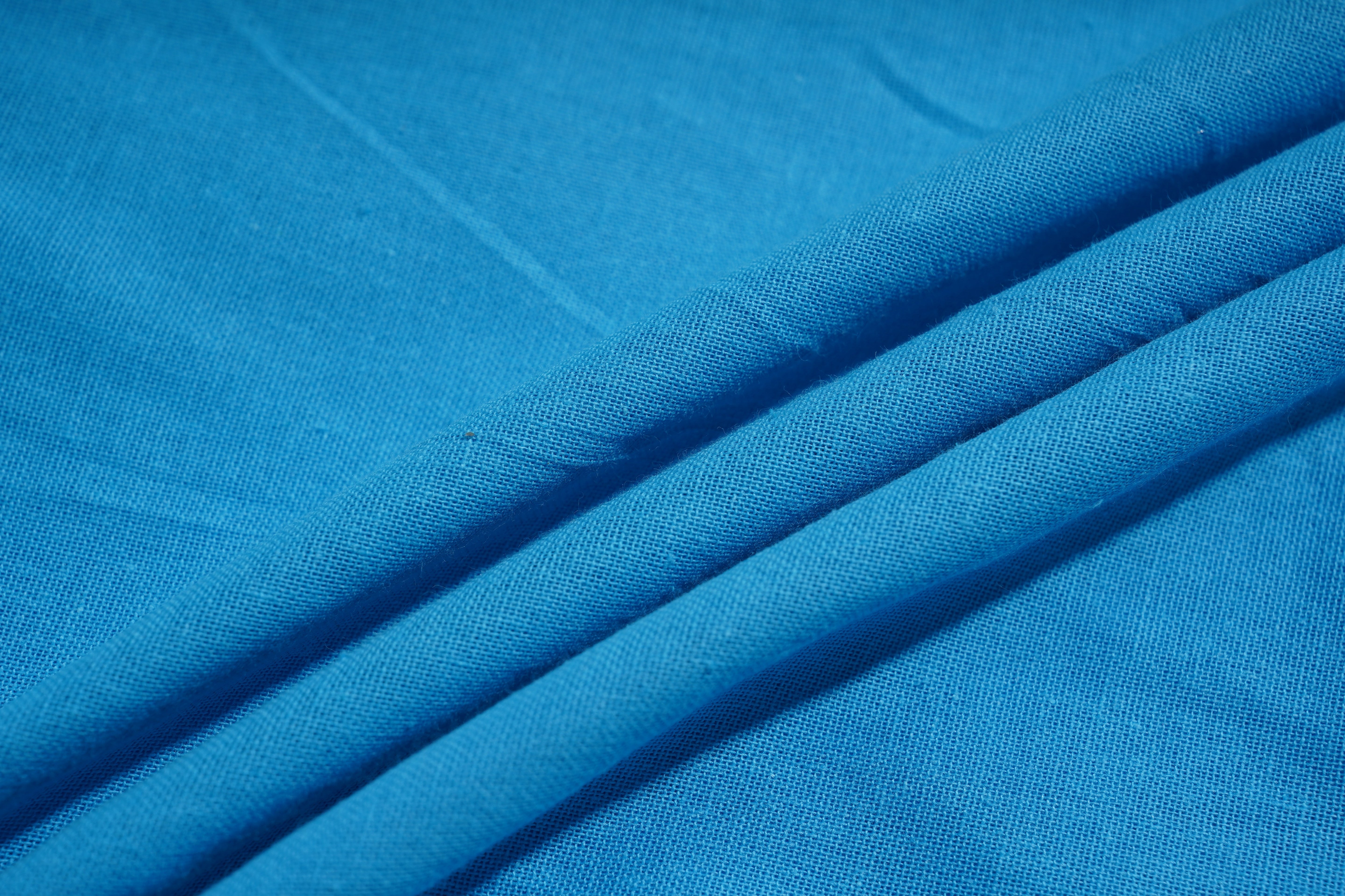 Close-up of blue fabric with folds, TCH Blue Rhinestone Bow Matching Set
