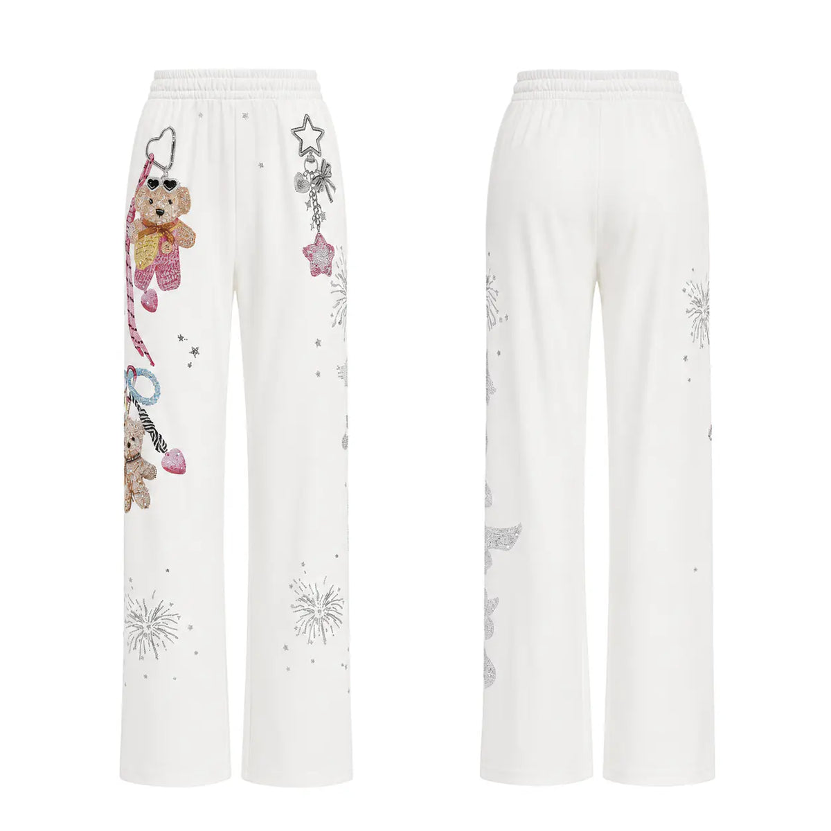 White wide-leg sweatpants shown from the front and back, featuring a teddy bear and star-themed graphic print on the left leg and subtle gray sparkly patterns on the right leg. TCH Crystal Bear Graphic Wide-Leg Sweatpants