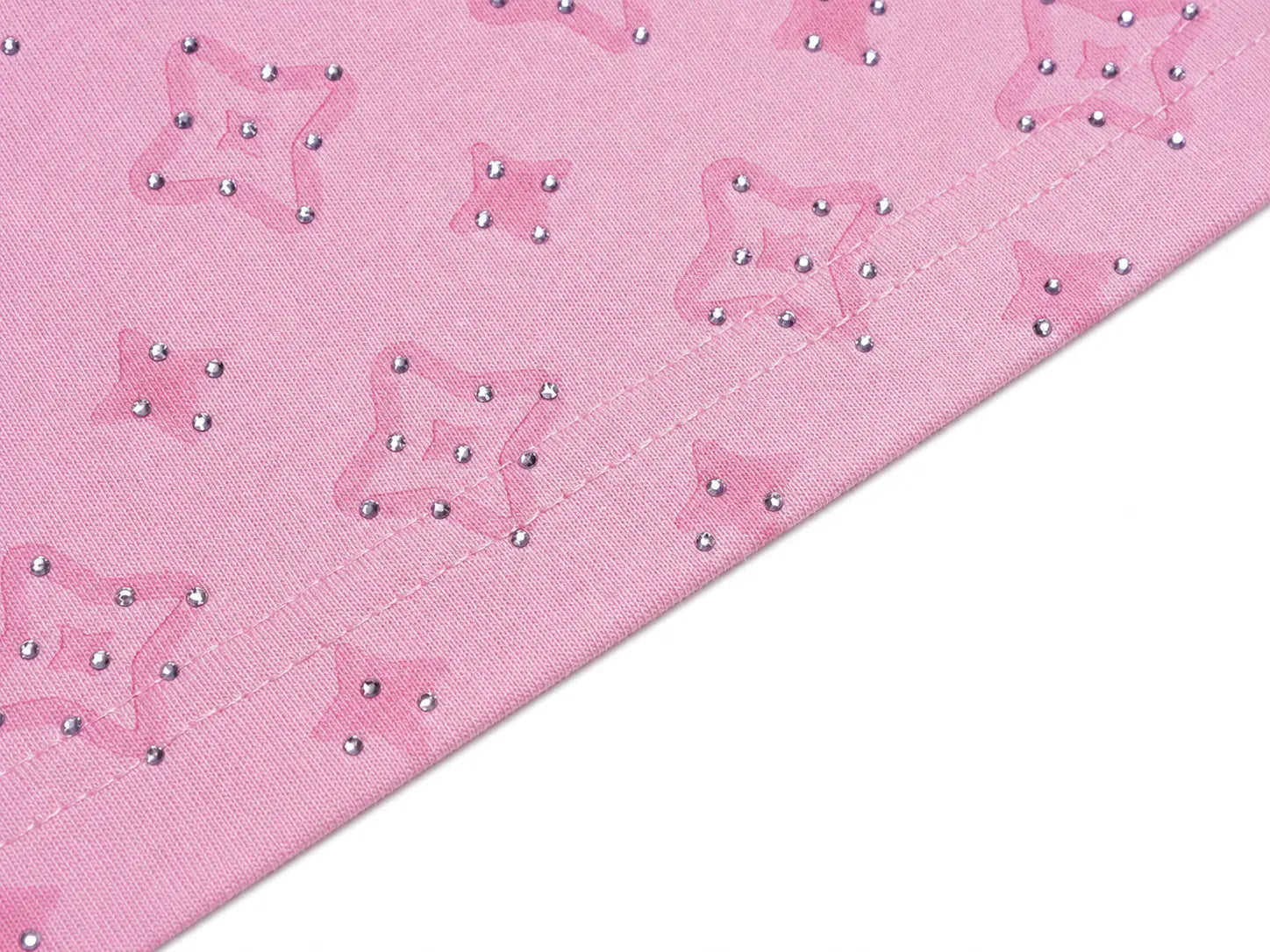 A close-up of a pink fabric with a repeating pattern of outlined starbursts and small metallic silver studs, shown against a white background. TCH Cute Teddy Bear Rhinestone Oversized T-Shirt Dress