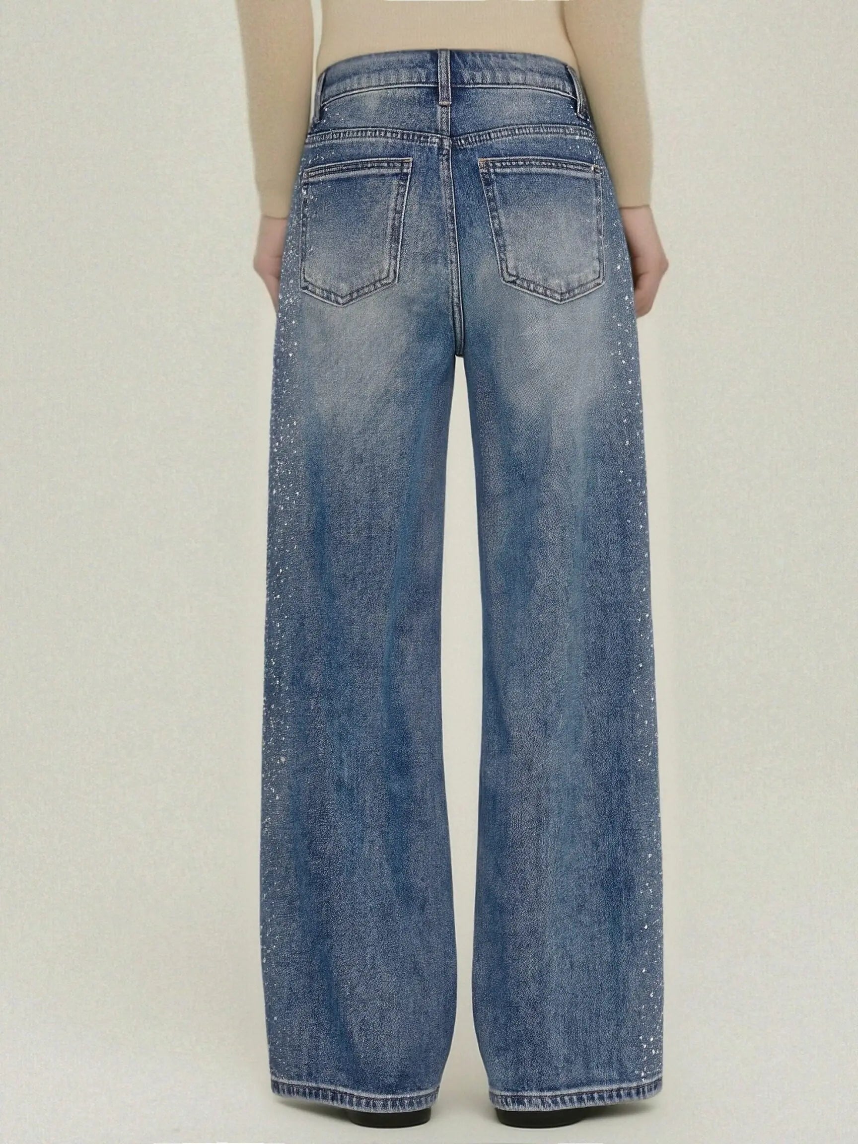 Blue jeans worn by a person on a plain background, TCH Firework Star Rhinestone Straight-Leg Blue Jeans