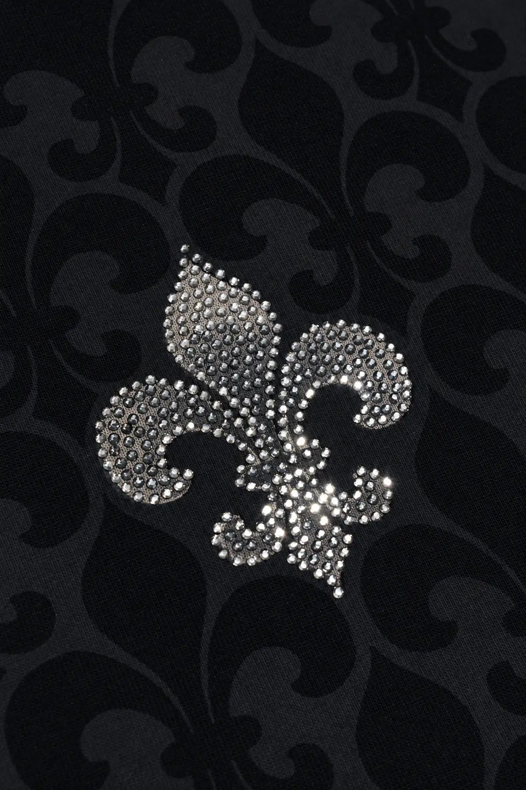 A silver rhinestone fleur-de-lis applique centered on a black damask fabric background. TCH Fleur-de-Lis Pattern Layered Long Sleeve T-Shirt