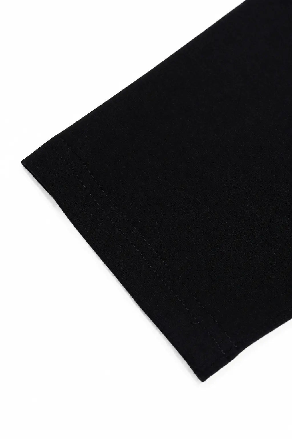 Close-up of a black fabric cuff with neat hem stitching on a plain white background. TCH Fleur-de-Lis Pattern Layered Long Sleeve T-Shirt