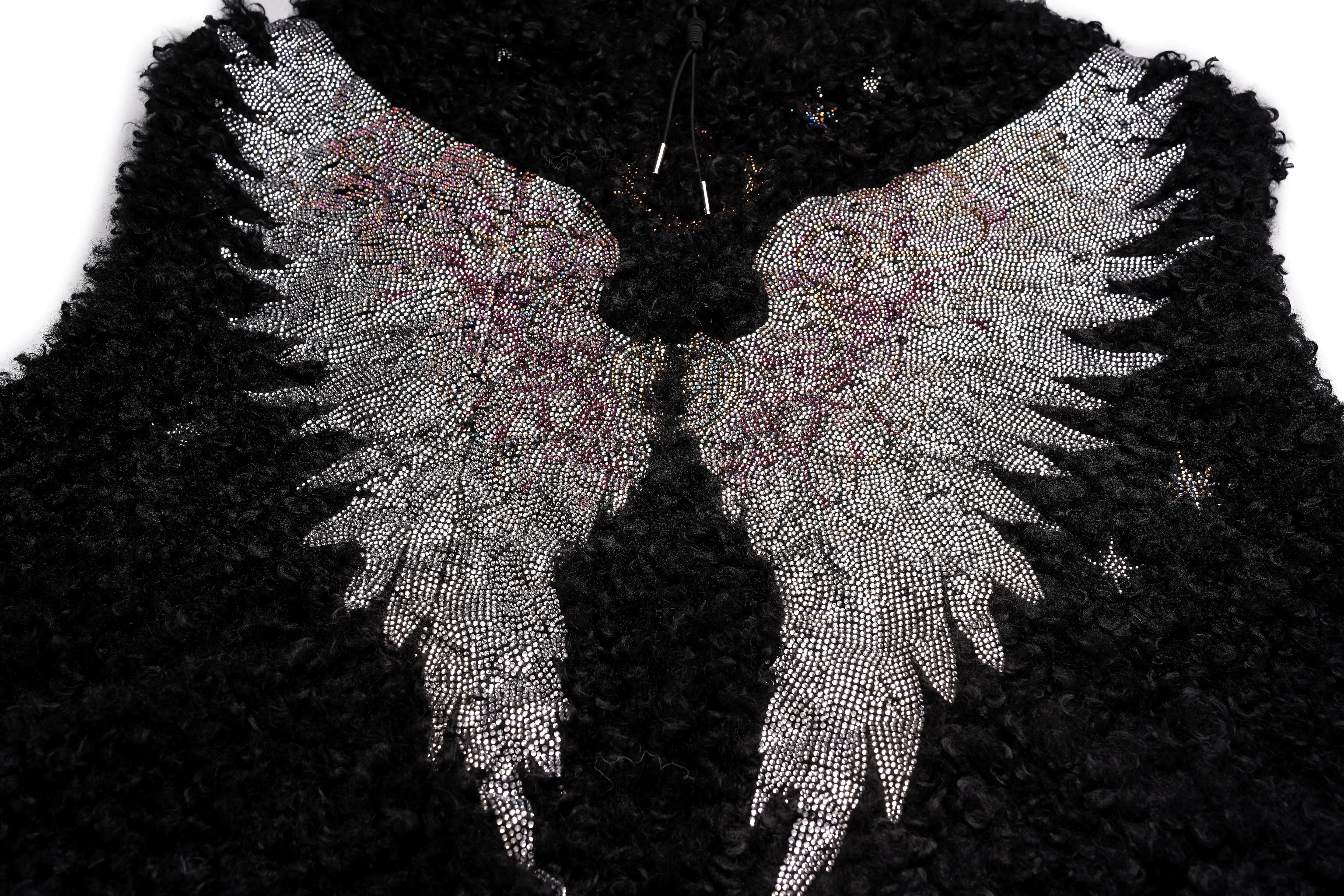 Decorative butterfly wings with intricate patterns on a textured black background, TCH Fuzzy Rhinestone Wings High-Neck Zip Sleeveless Vest
