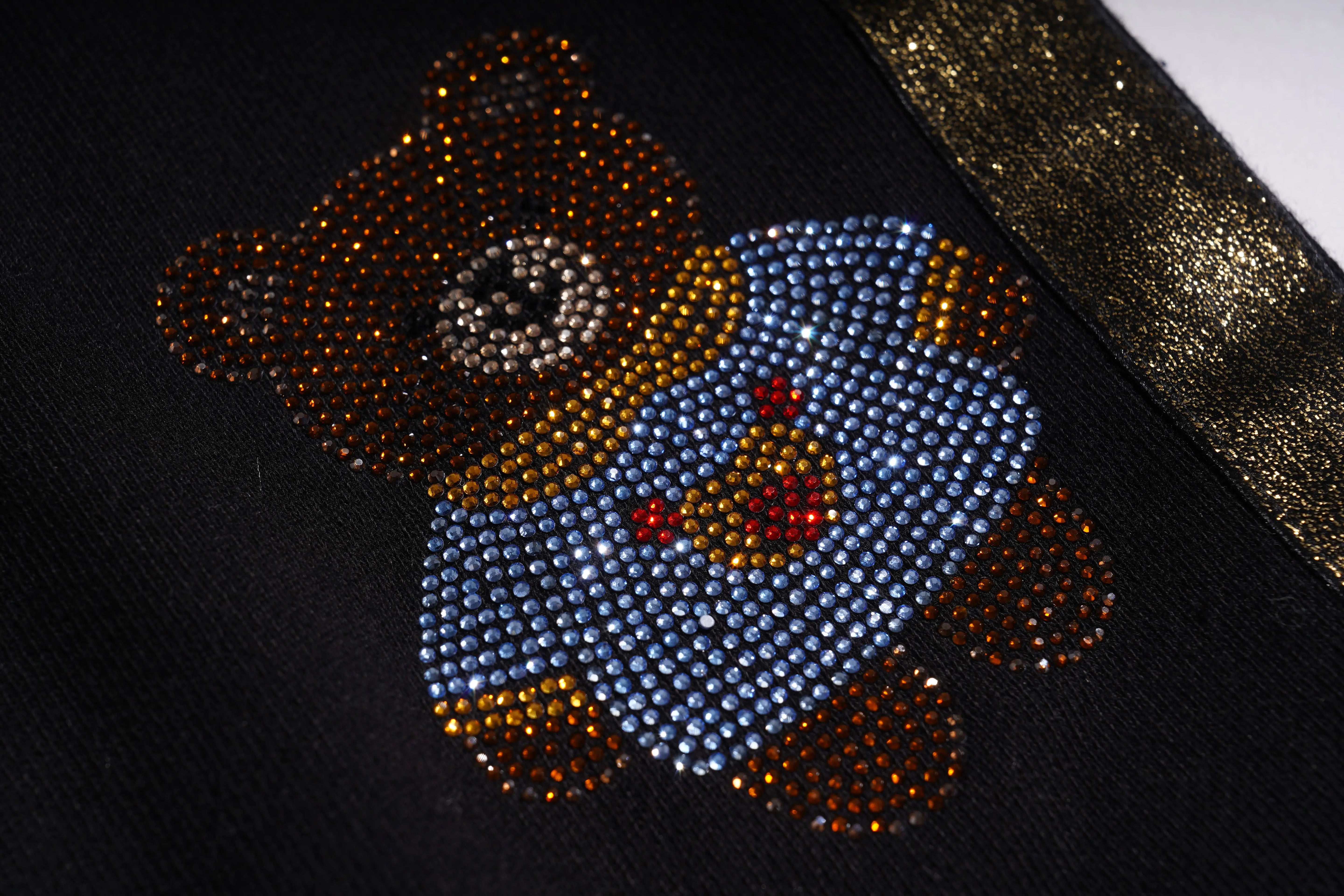 Decorative item with a dog design made of small stones on a dark background, TCH Galaxy Rhinestone Black Jogger Pants Luxury Streetwear Brand Official Showcase