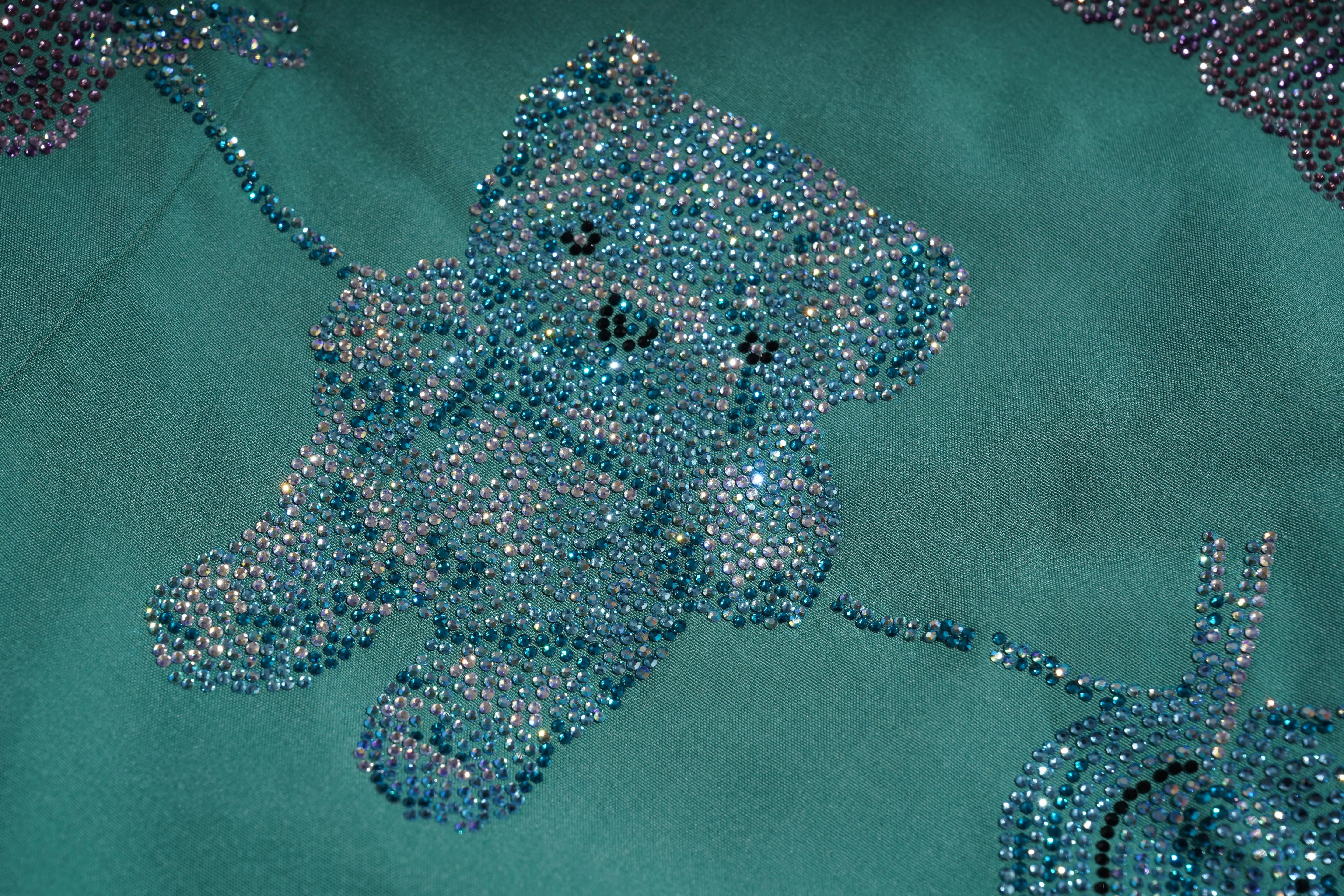 Teal fabric with a teddy bear design made of blue rhinestones, TCH Green Rhinestone Teddy Laundry Story Dress