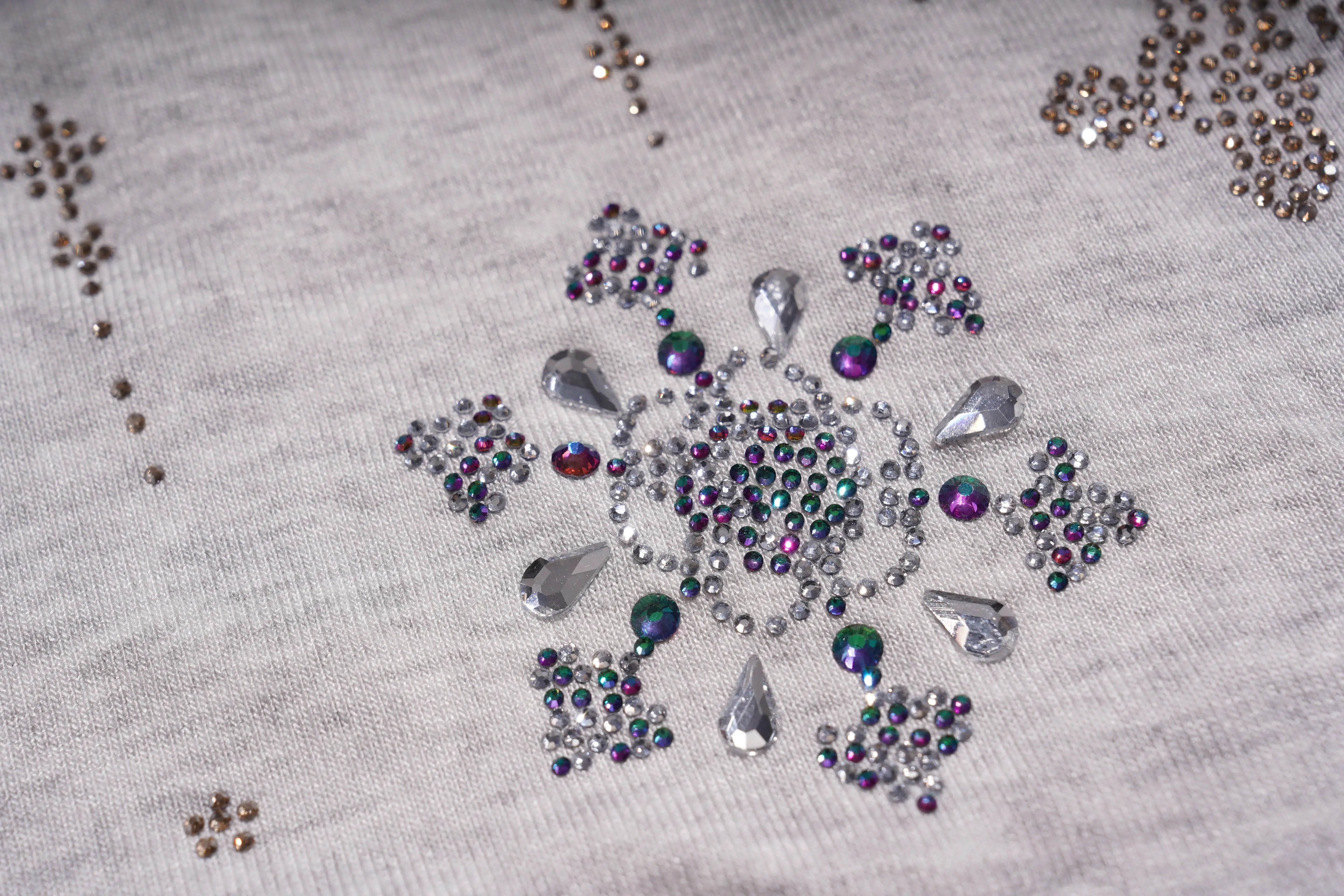 Collection of decorative rhinestones on a light fabric background, TCH Grey Rhinestone Butterfly Pajama Set