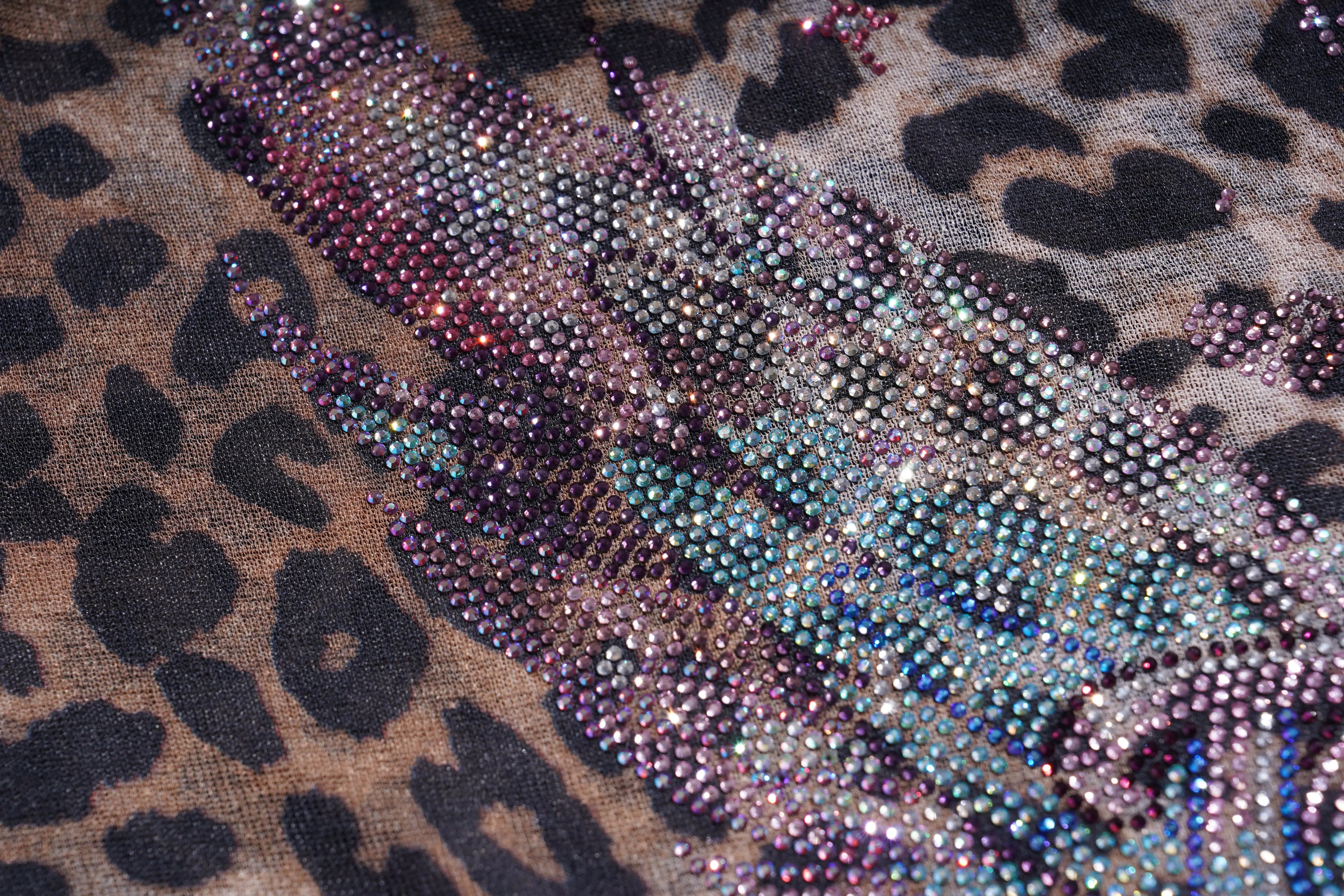 Leopard print fabric with rhinestone embellishments, TCH Leopard Print Rhinestone Butterfly Fitted T-Shirt
