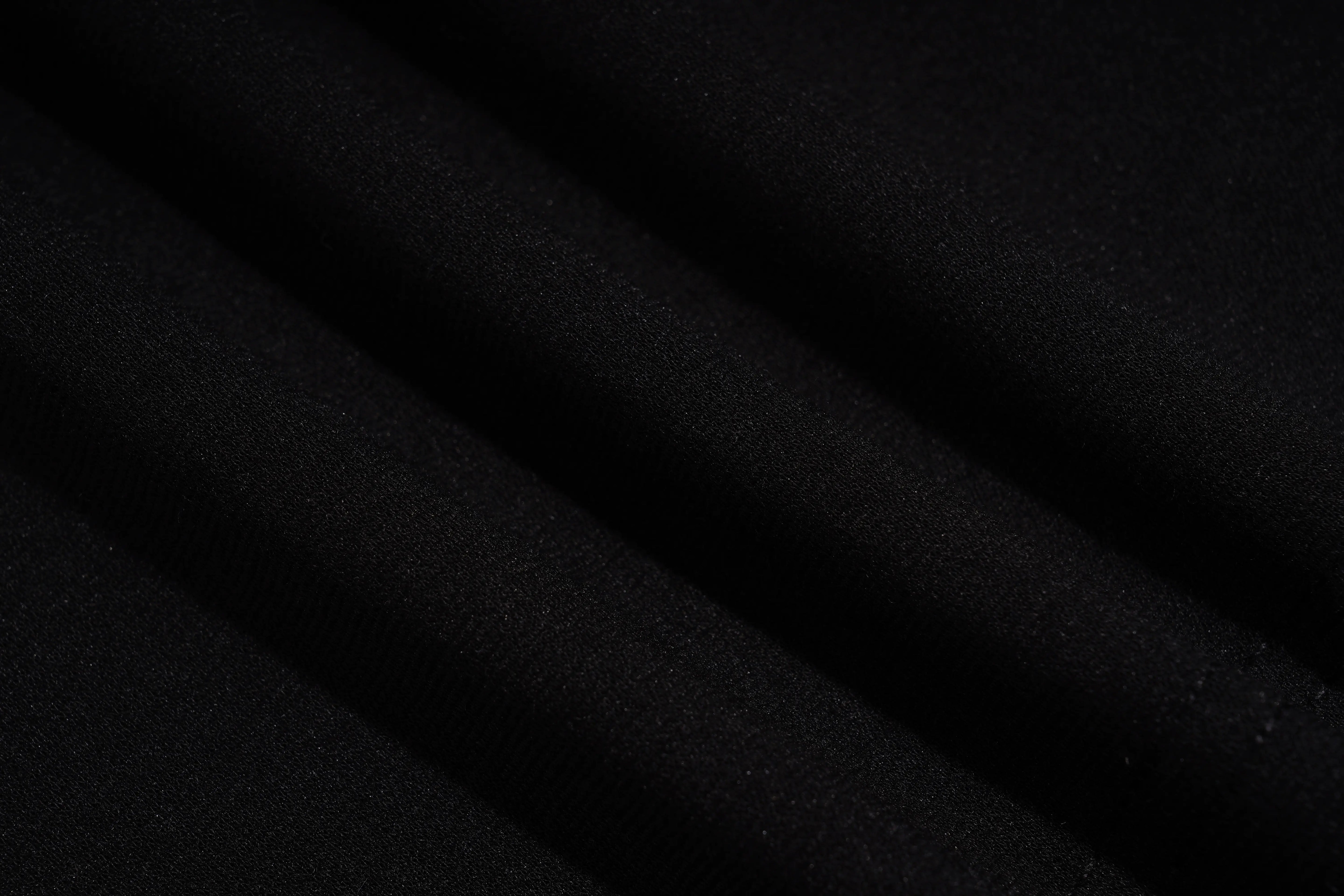 Close-up of black fabric texture, TCH Leopard Rhinestone Sleeveless Polo Shirt
