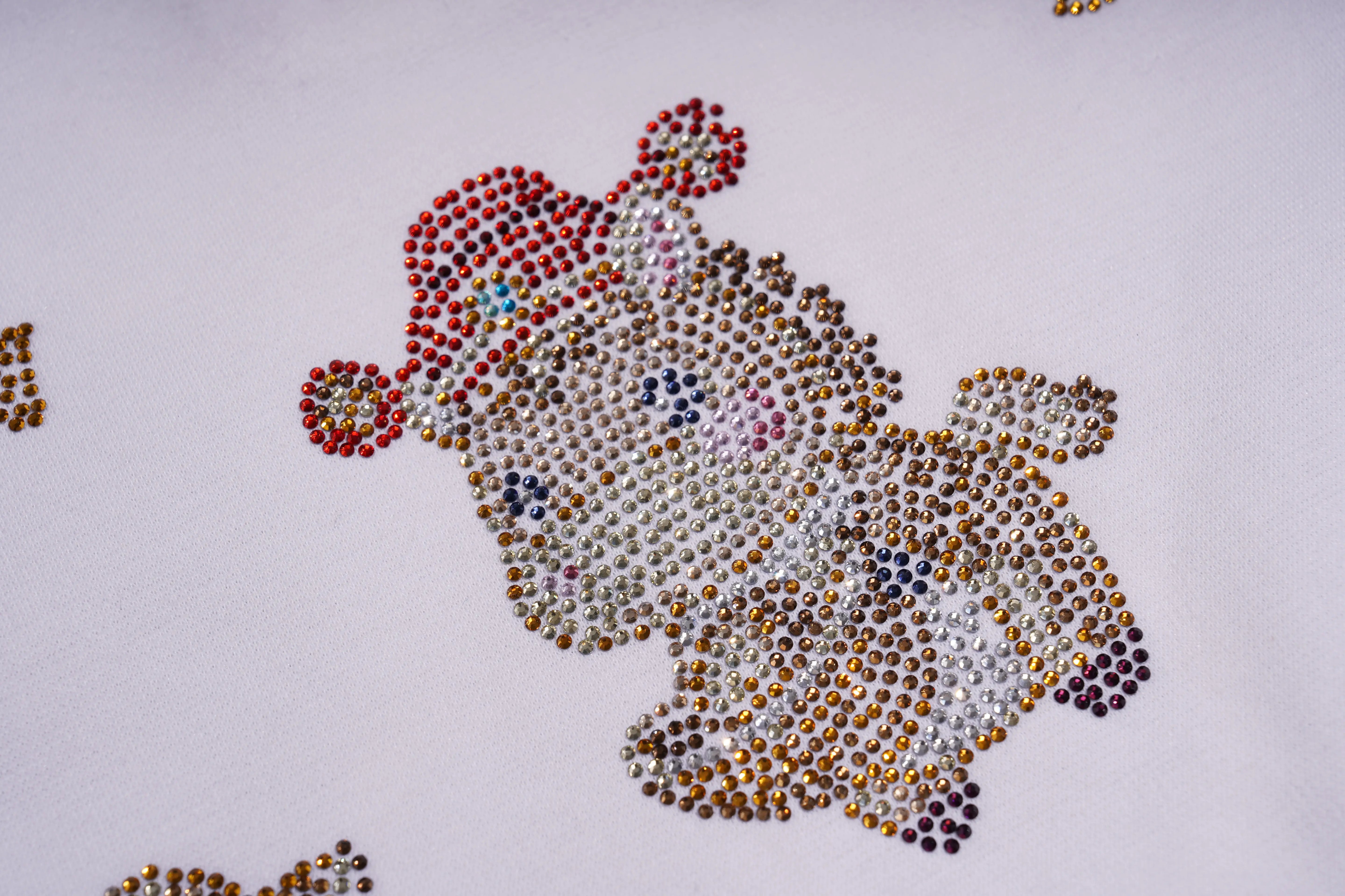 Decorative design made of small colored stones on a white background, TCH Lucky Pony Rhinestone Sleeveless Polo Shirt