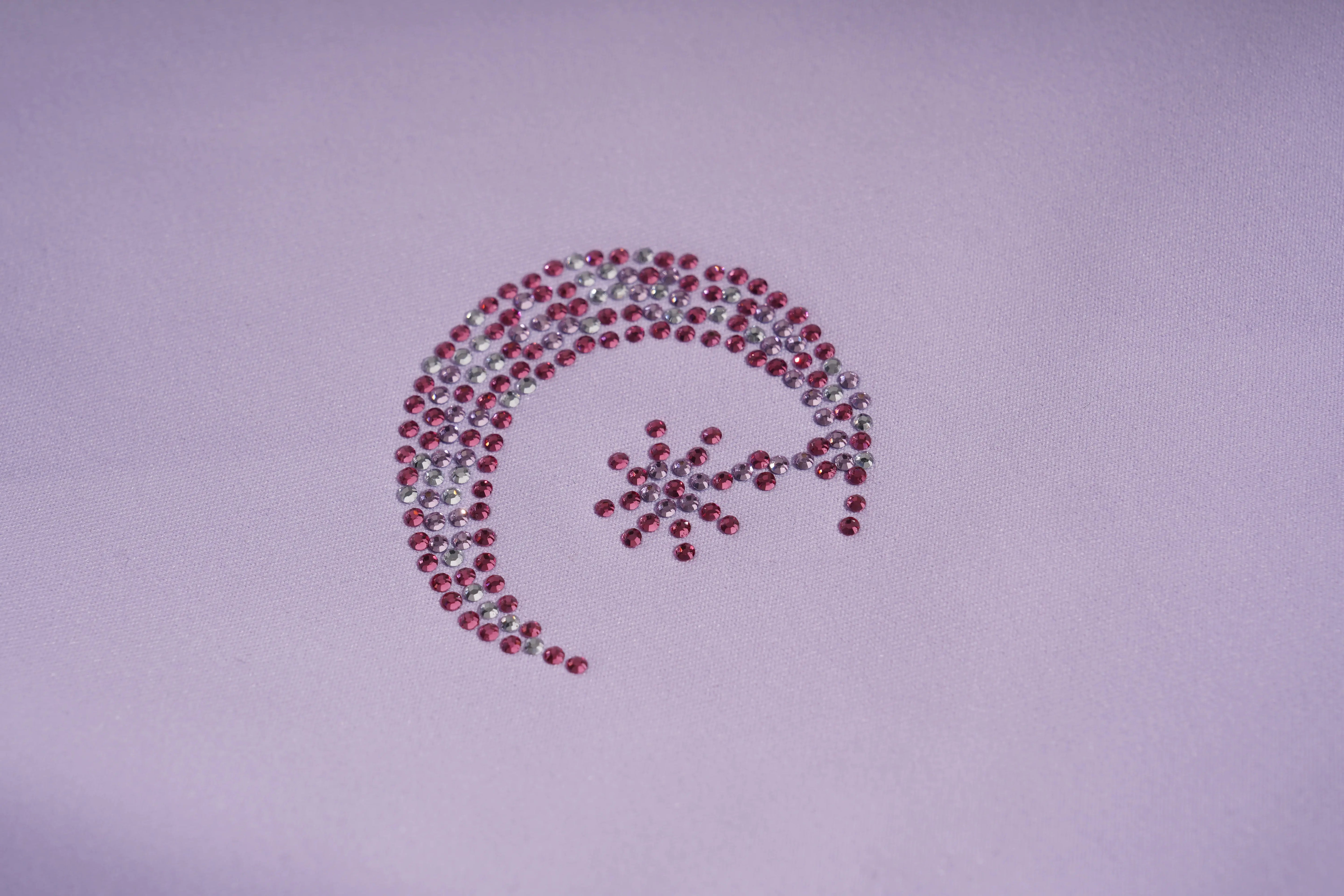 Decorative design made of red and clear gemstones on a light purple background, TCH Moonlight Rhinestone Wide-Leg Pants